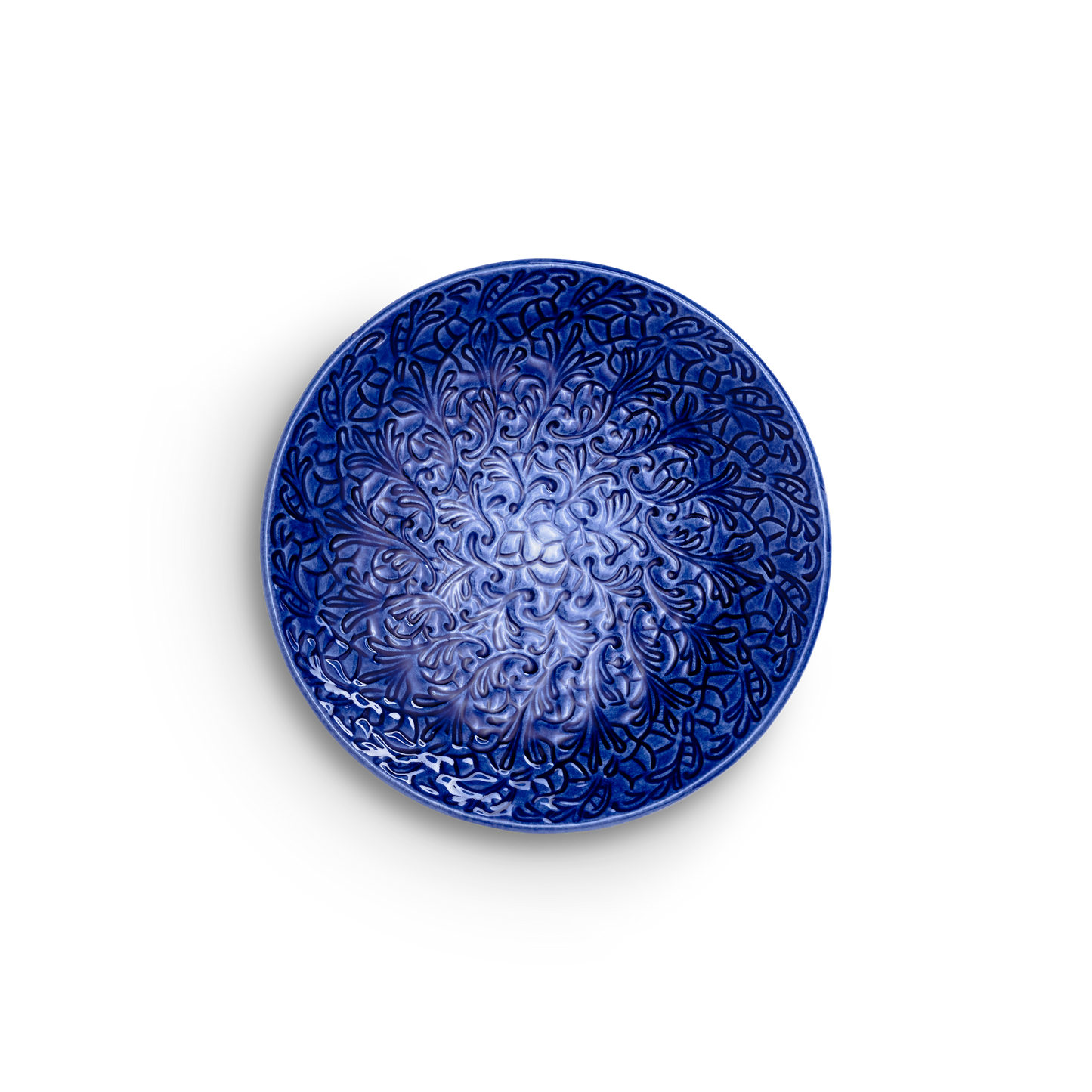 Decorative blue plate with intricate patterns on a white background