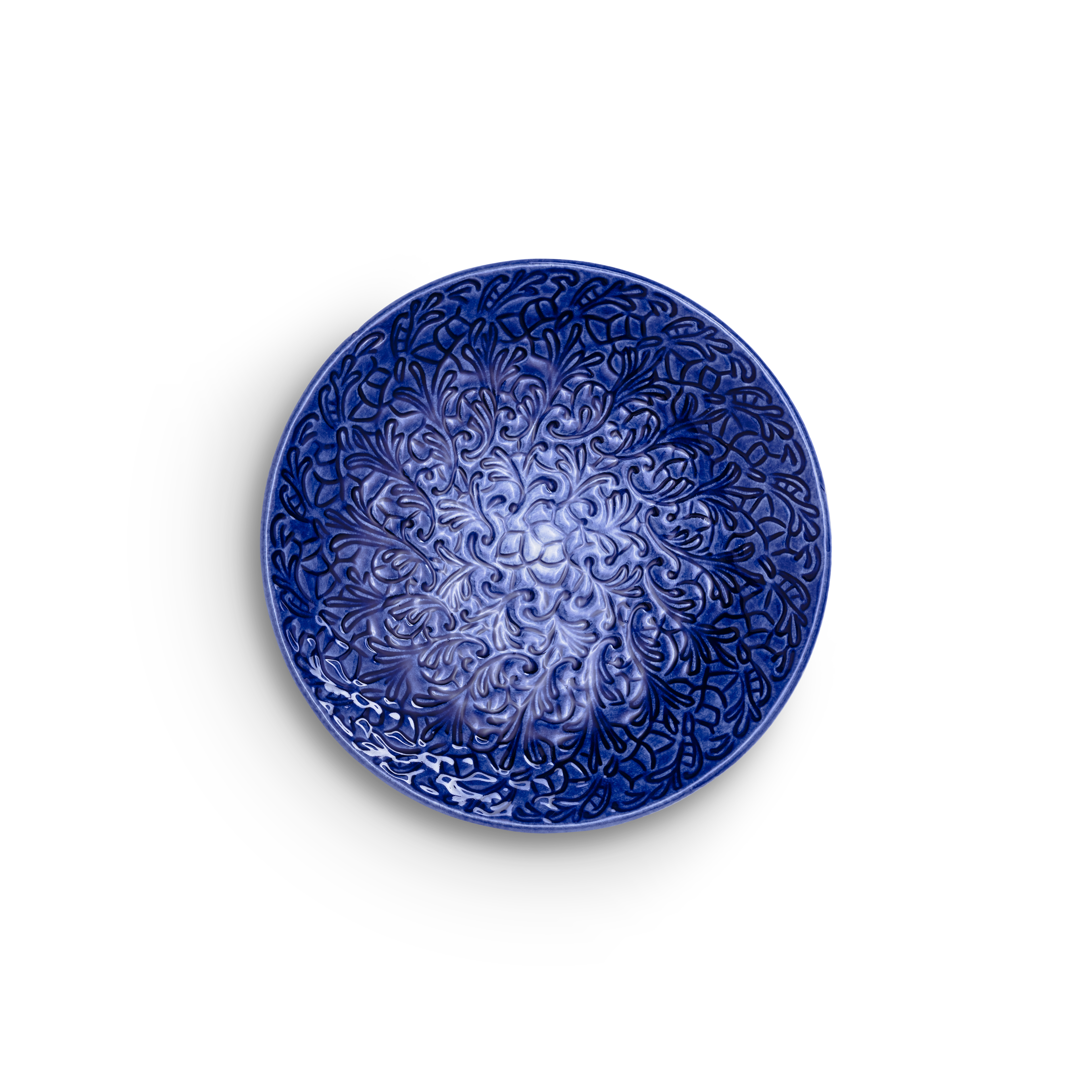 Decorative blue plate with intricate patterns on a white background