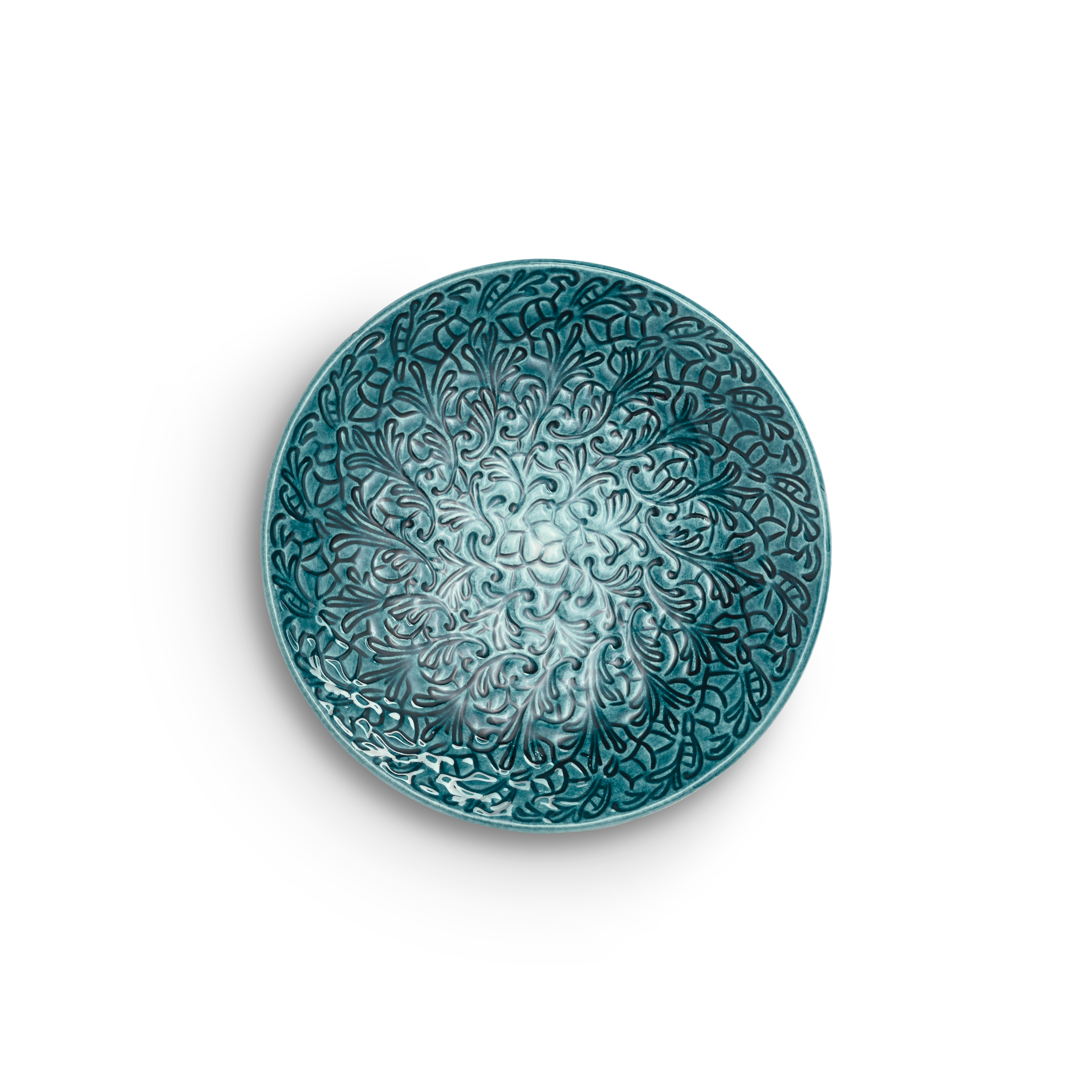 Decorative teal ceramic plate with intricate patterns on a white background