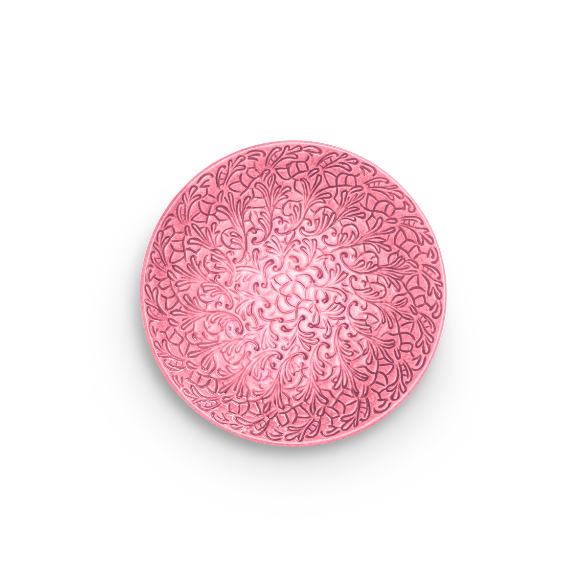 Pink decorative plate with intricate patterns on a white background