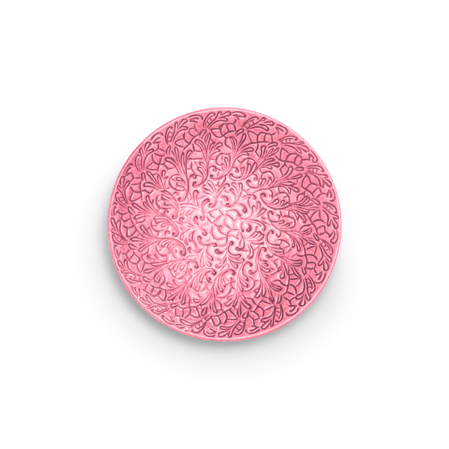 Pink decorative plate with intricate patterns on a white background