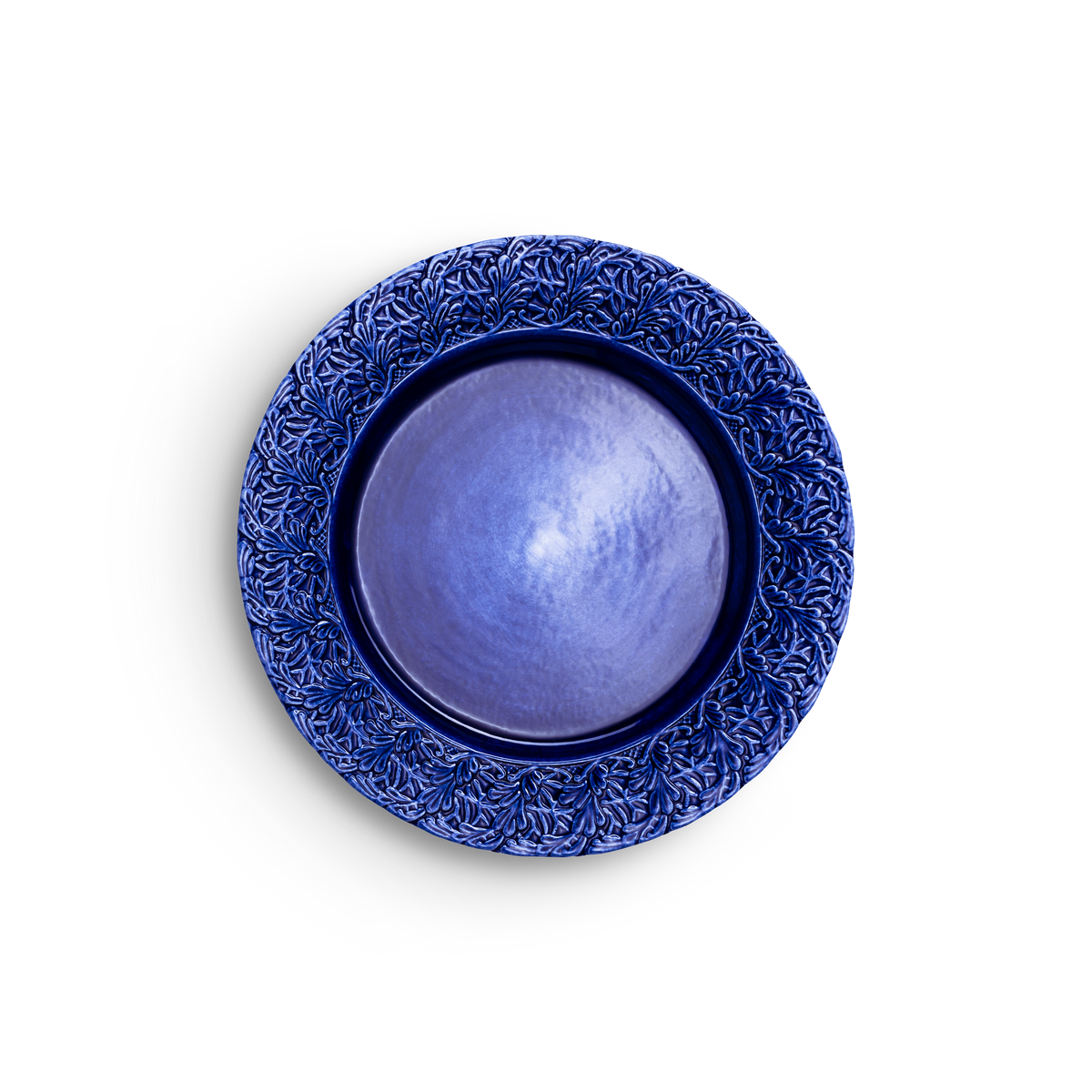 Decorative blue plate with intricate patterns on a white background