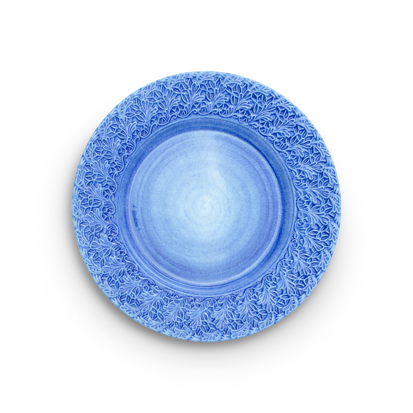 Blue decorative plate with intricate patterns on a white background