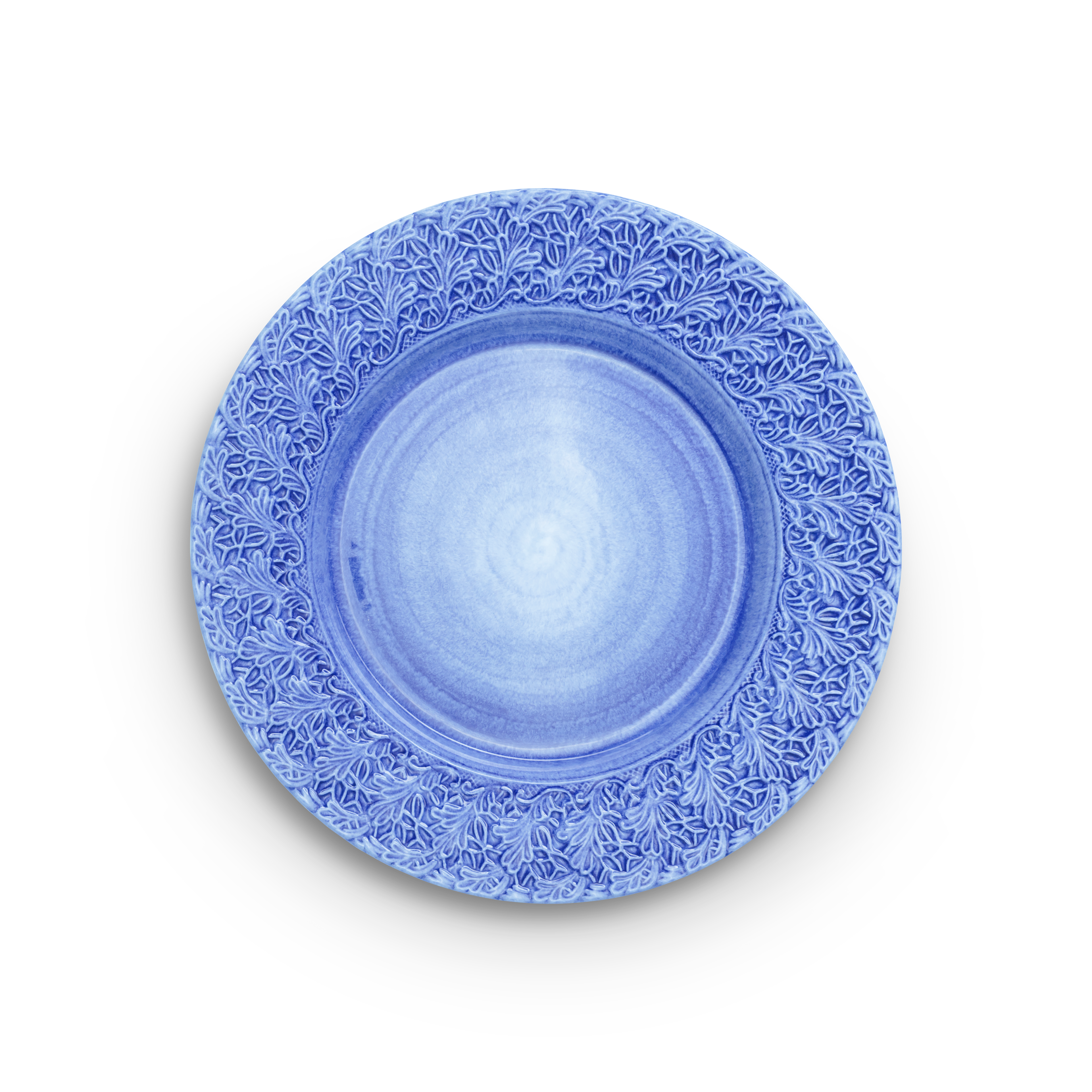 Blue decorative plate with intricate patterns on a white background