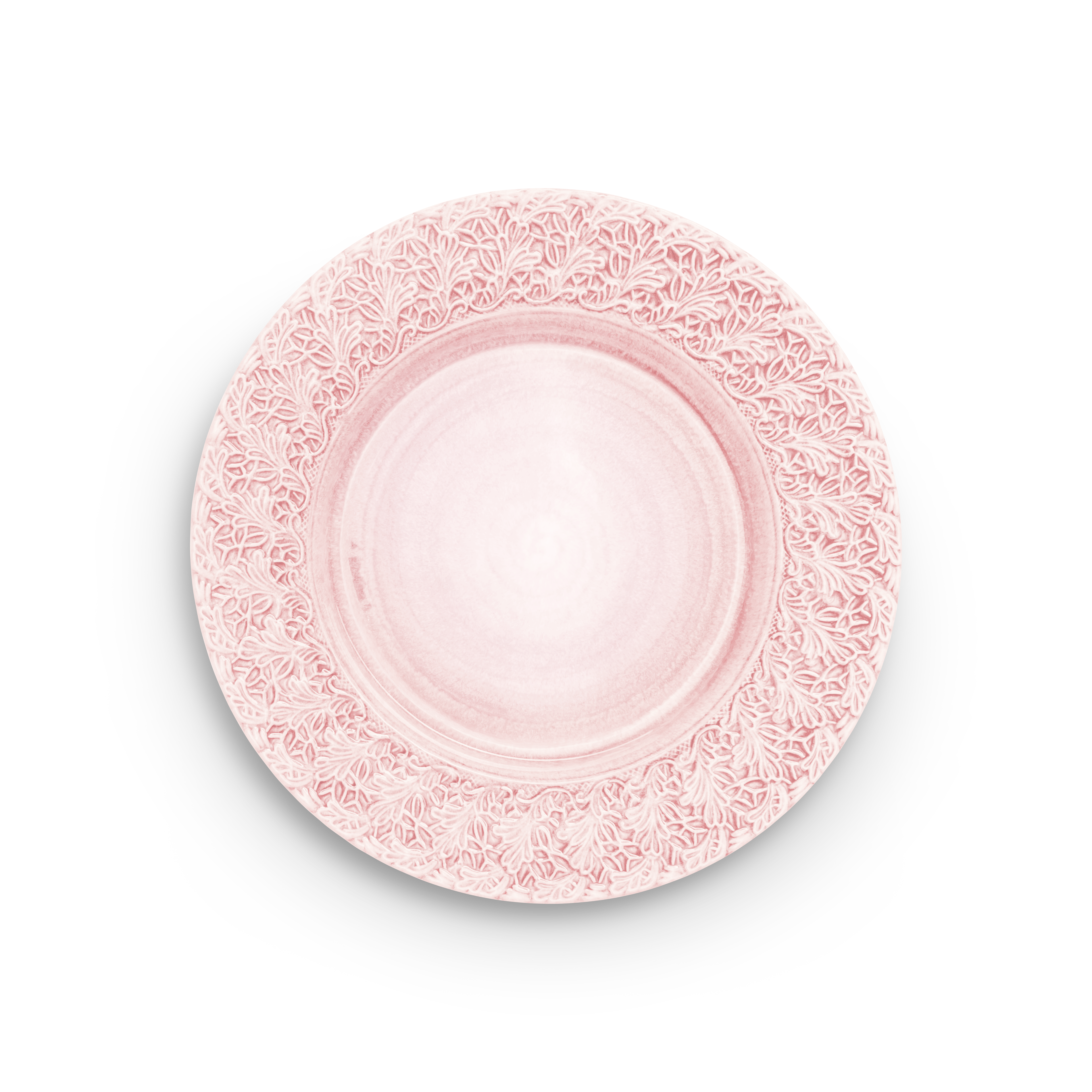 Pink decorative plate with intricate patterns on a white background
