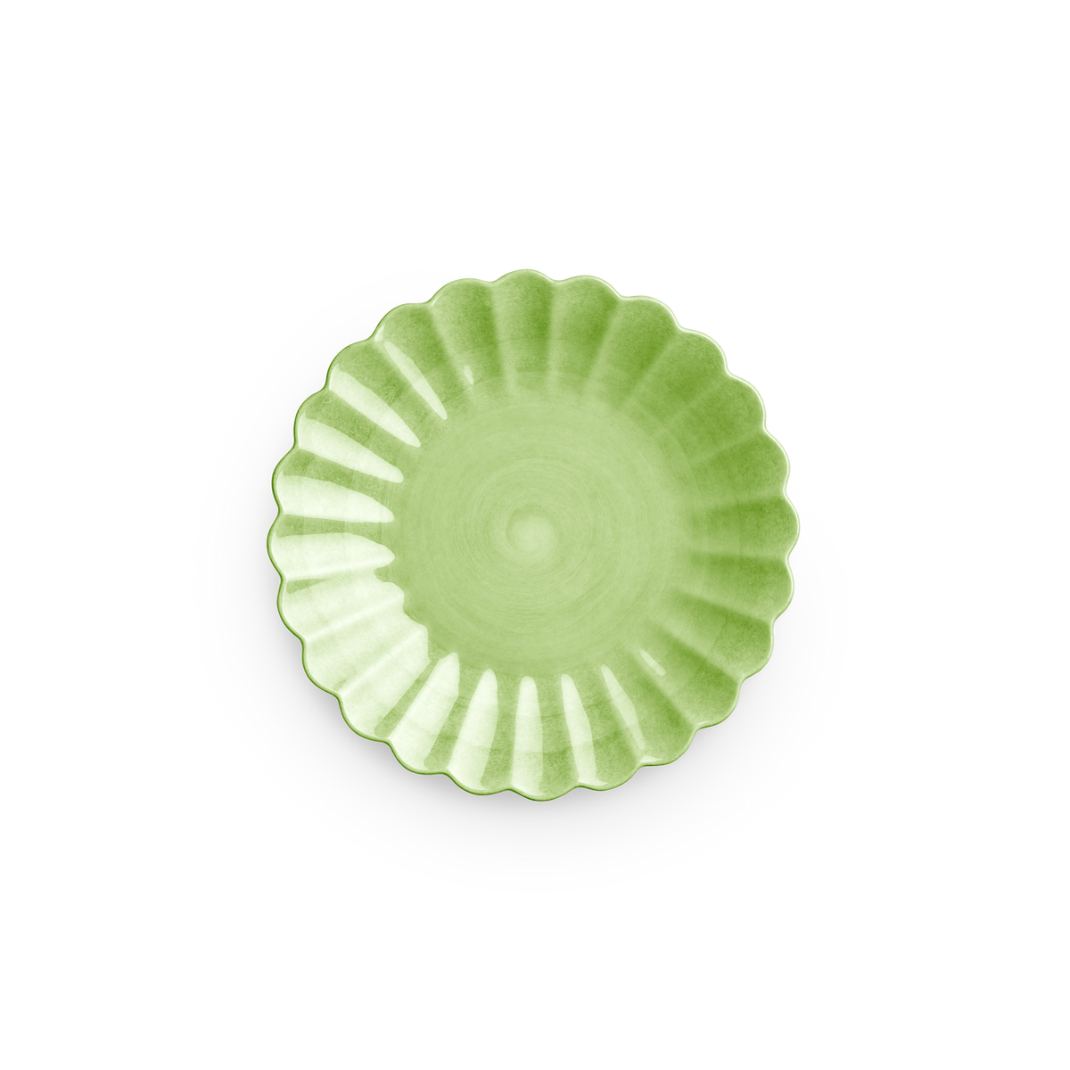 Green ceramic plate with decorative edge on a white background