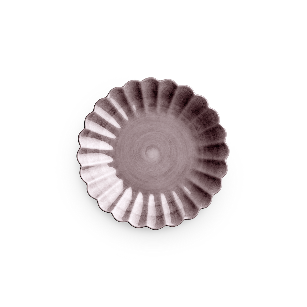 Decorative ceramic plate with a scalloped edge on a white background