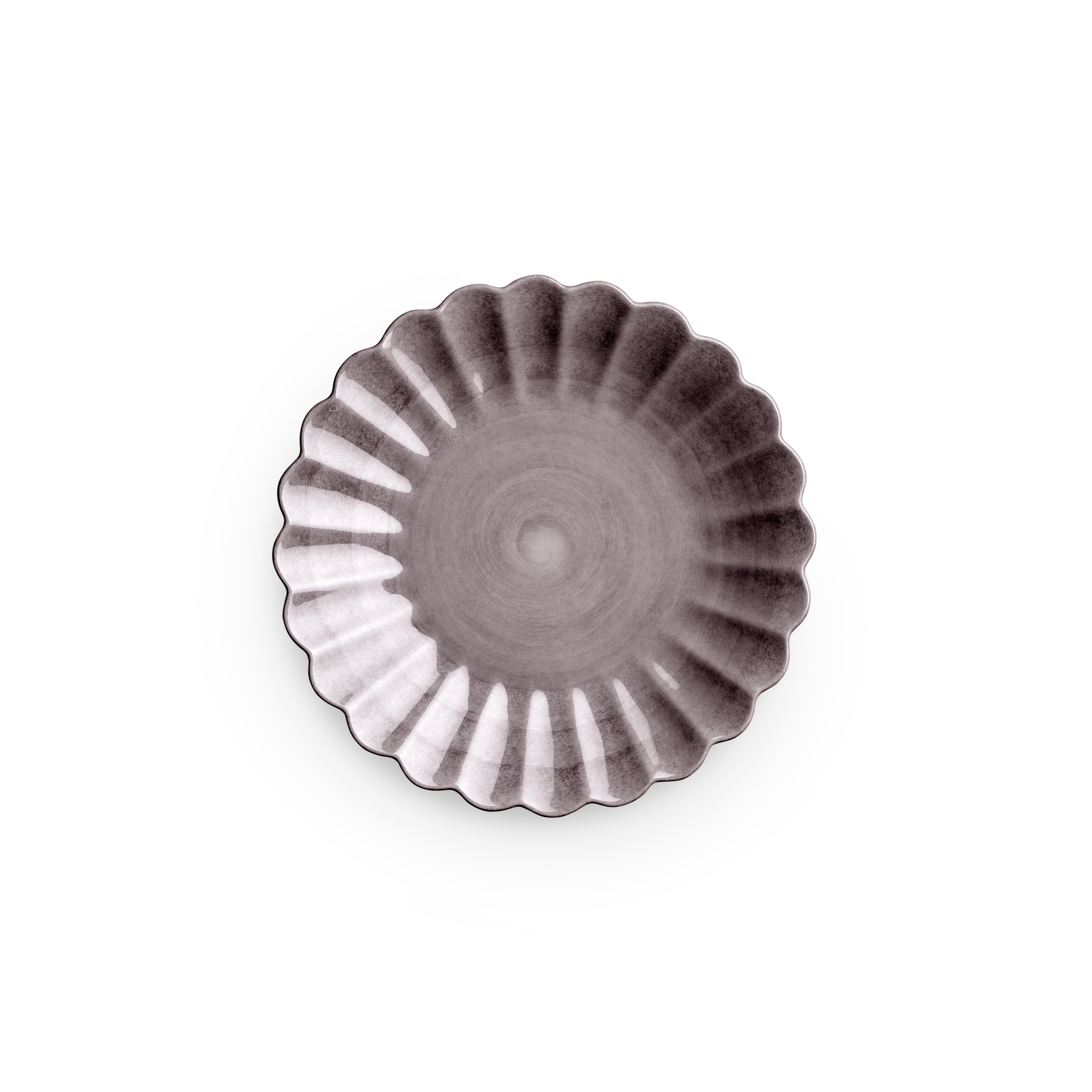 Decorative ceramic plate with a scalloped edge on a white background