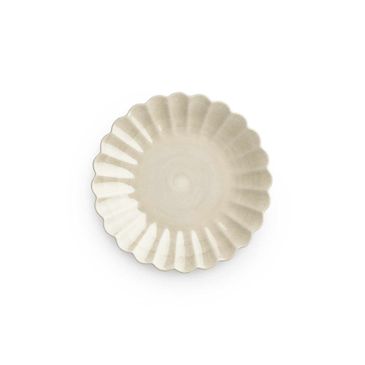 Decorative plate with scalloped edge on a white background