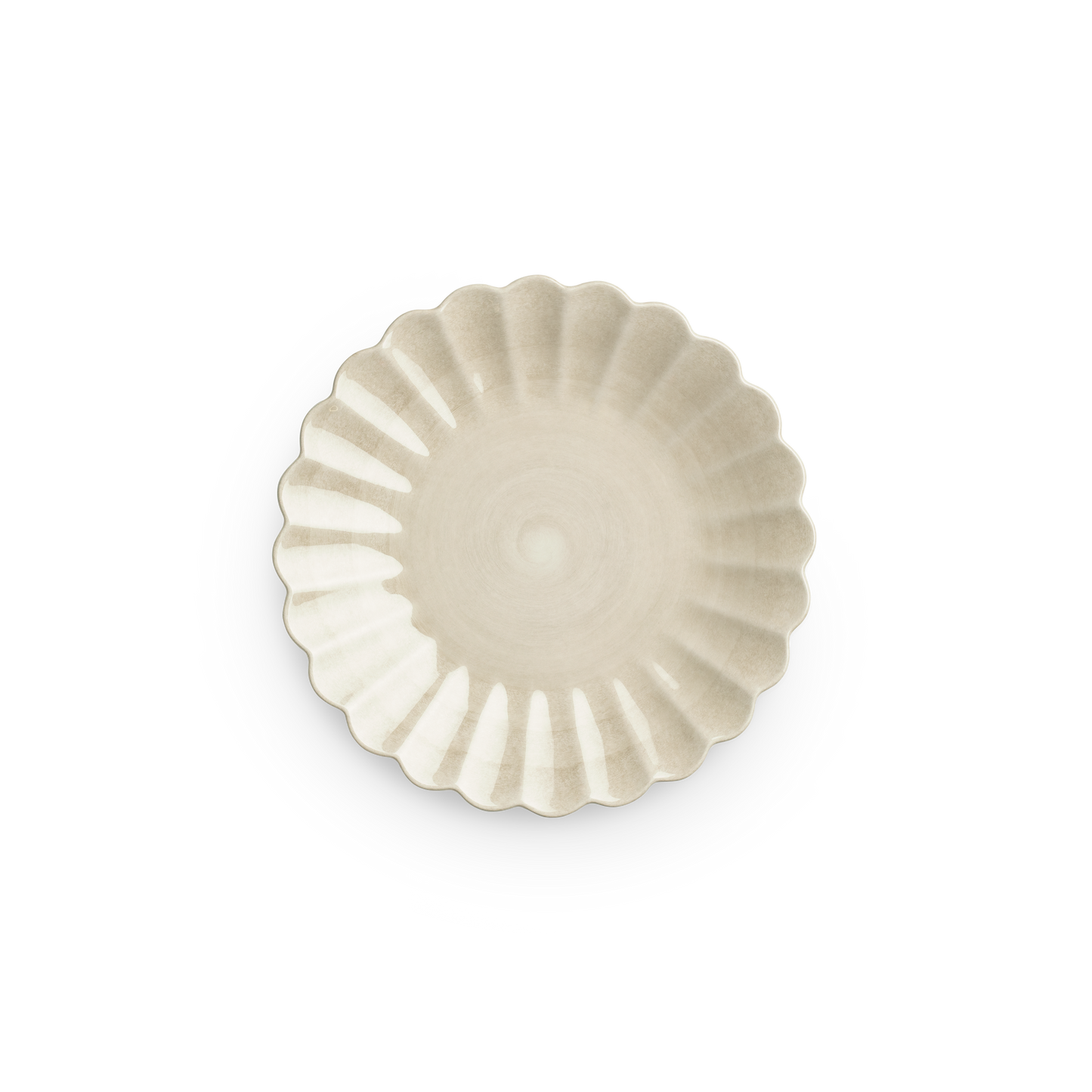 Decorative plate with scalloped edge on a white background