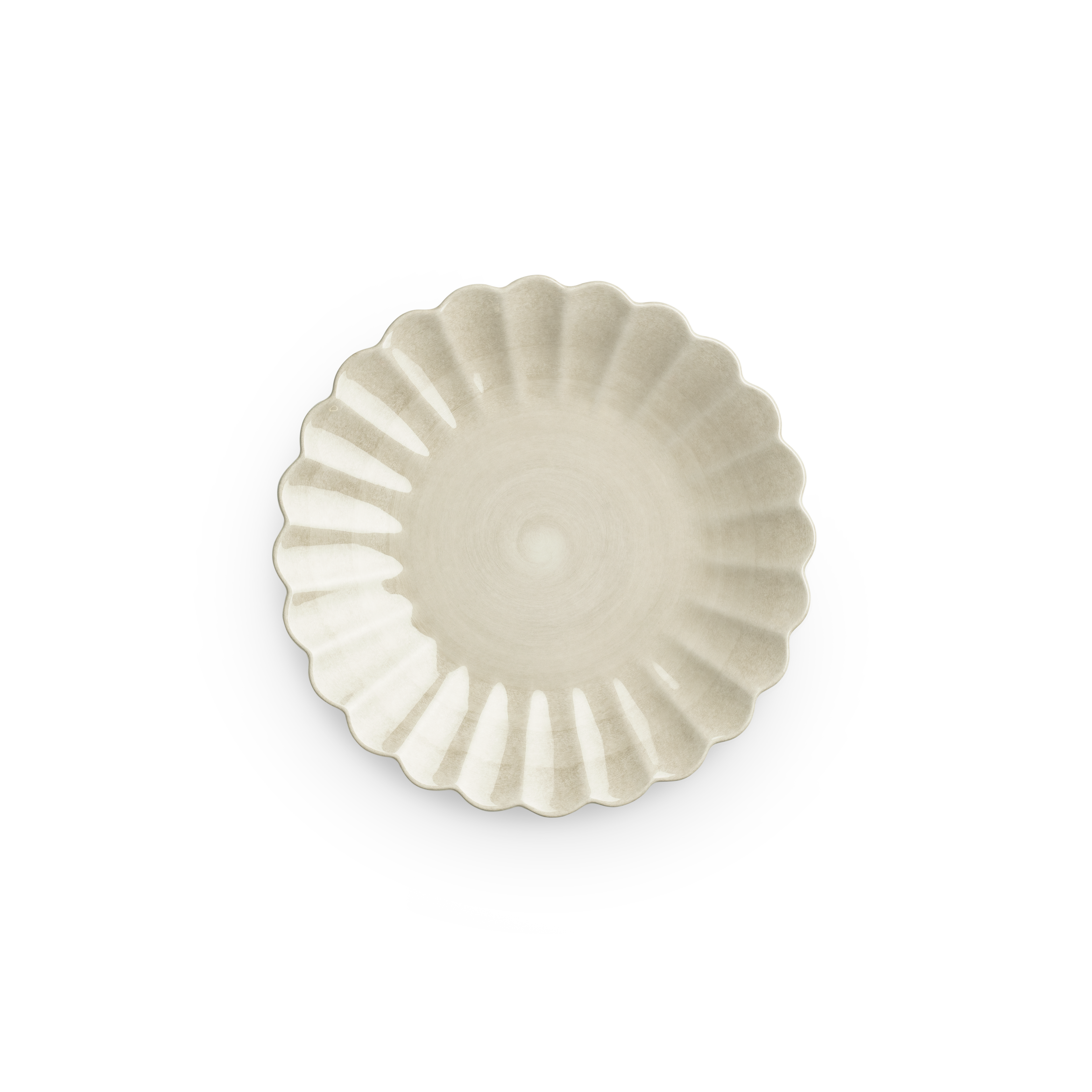 Decorative plate with scalloped edge on a white background