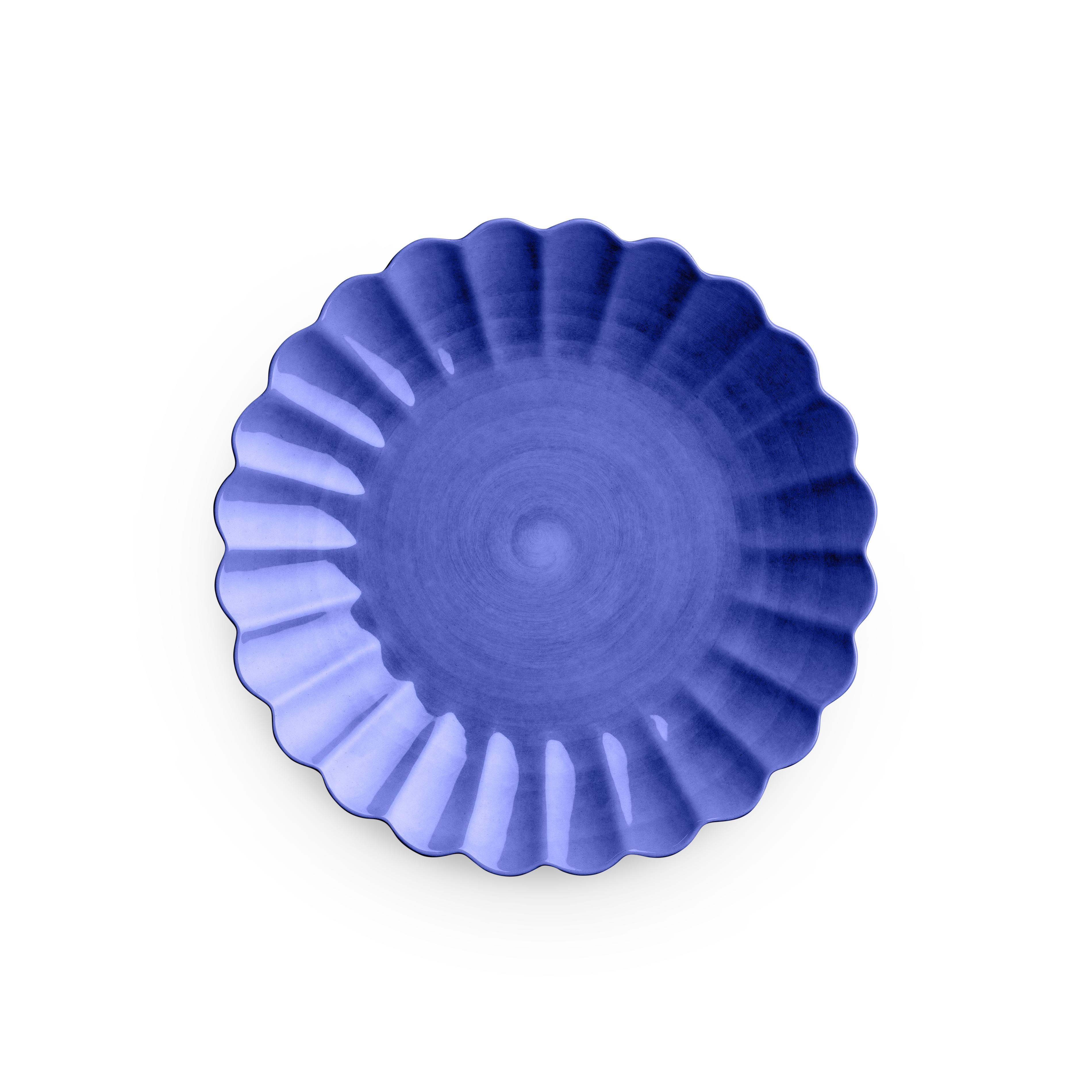 Blue fluted baking dish on a white background