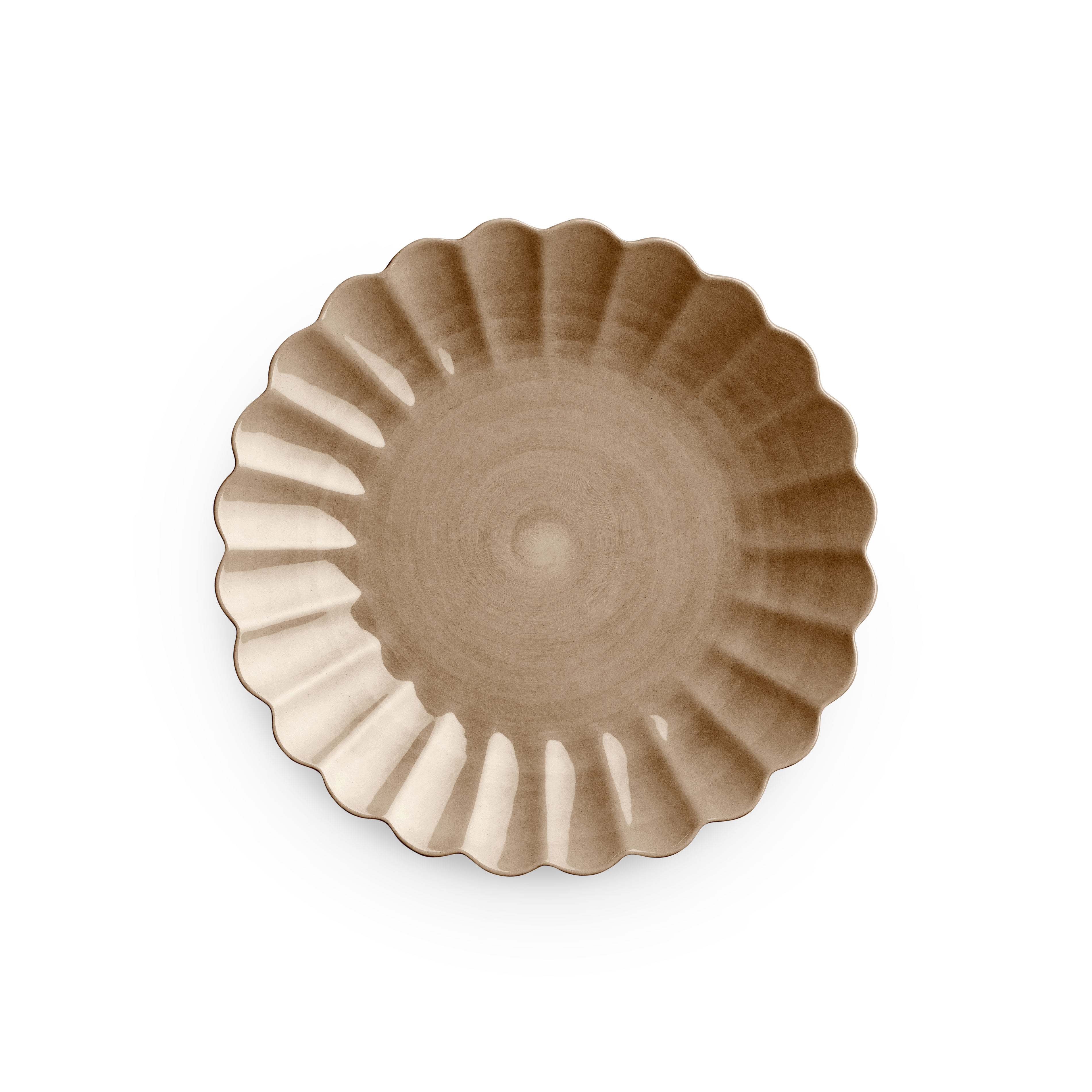 Decorative brown plate with scalloped edge on a white background
