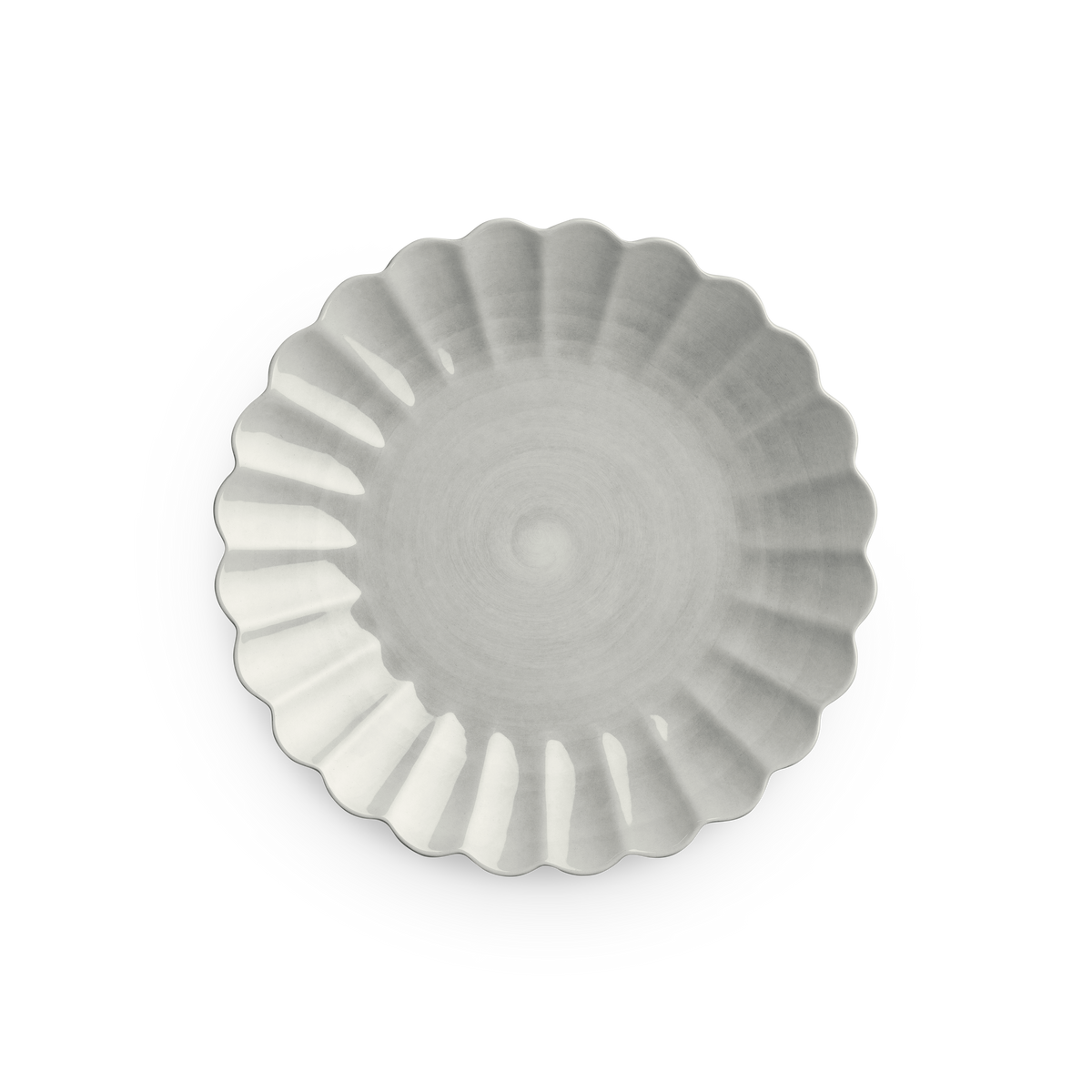 Fluted ceramic bowl on a white background