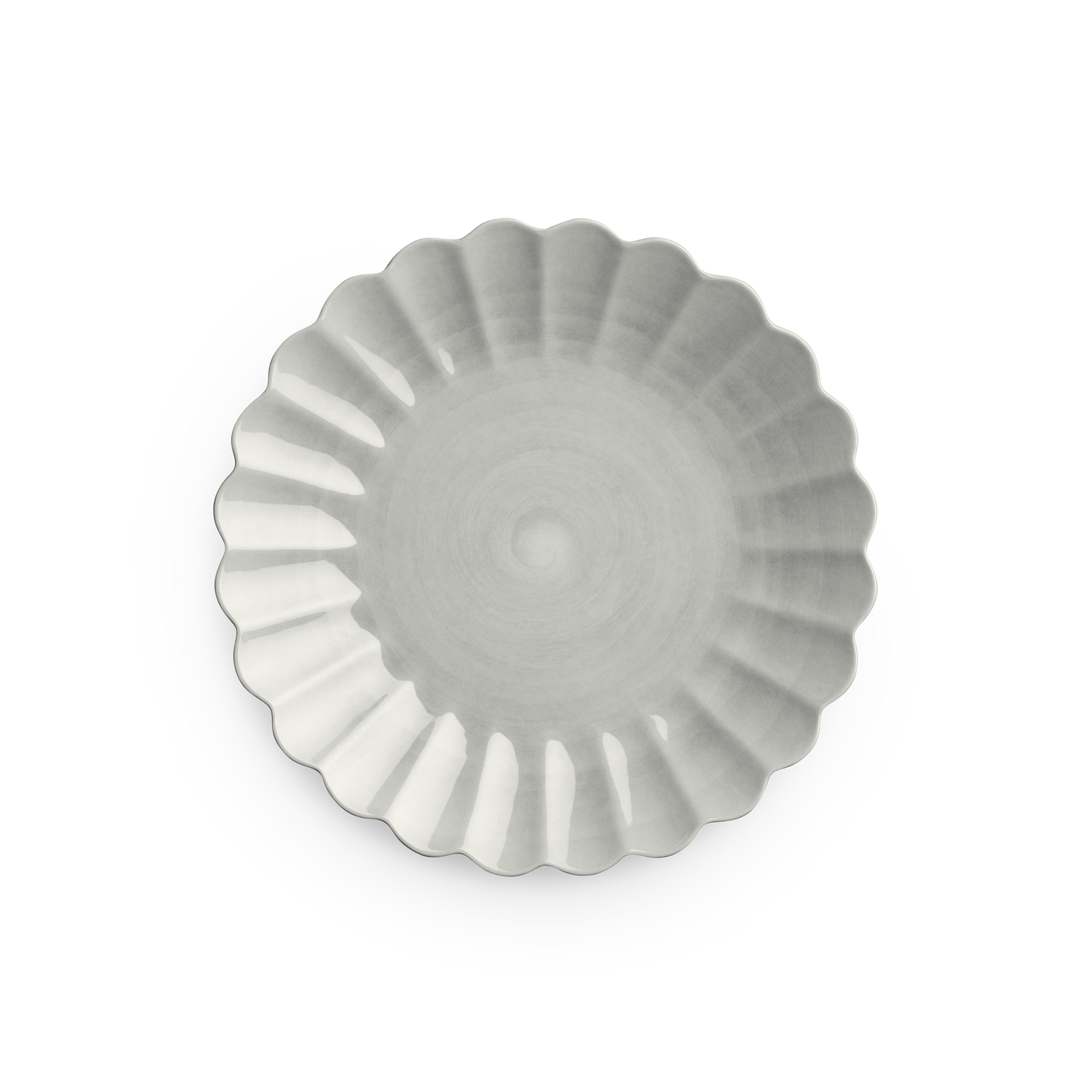 Fluted ceramic bowl on a white background