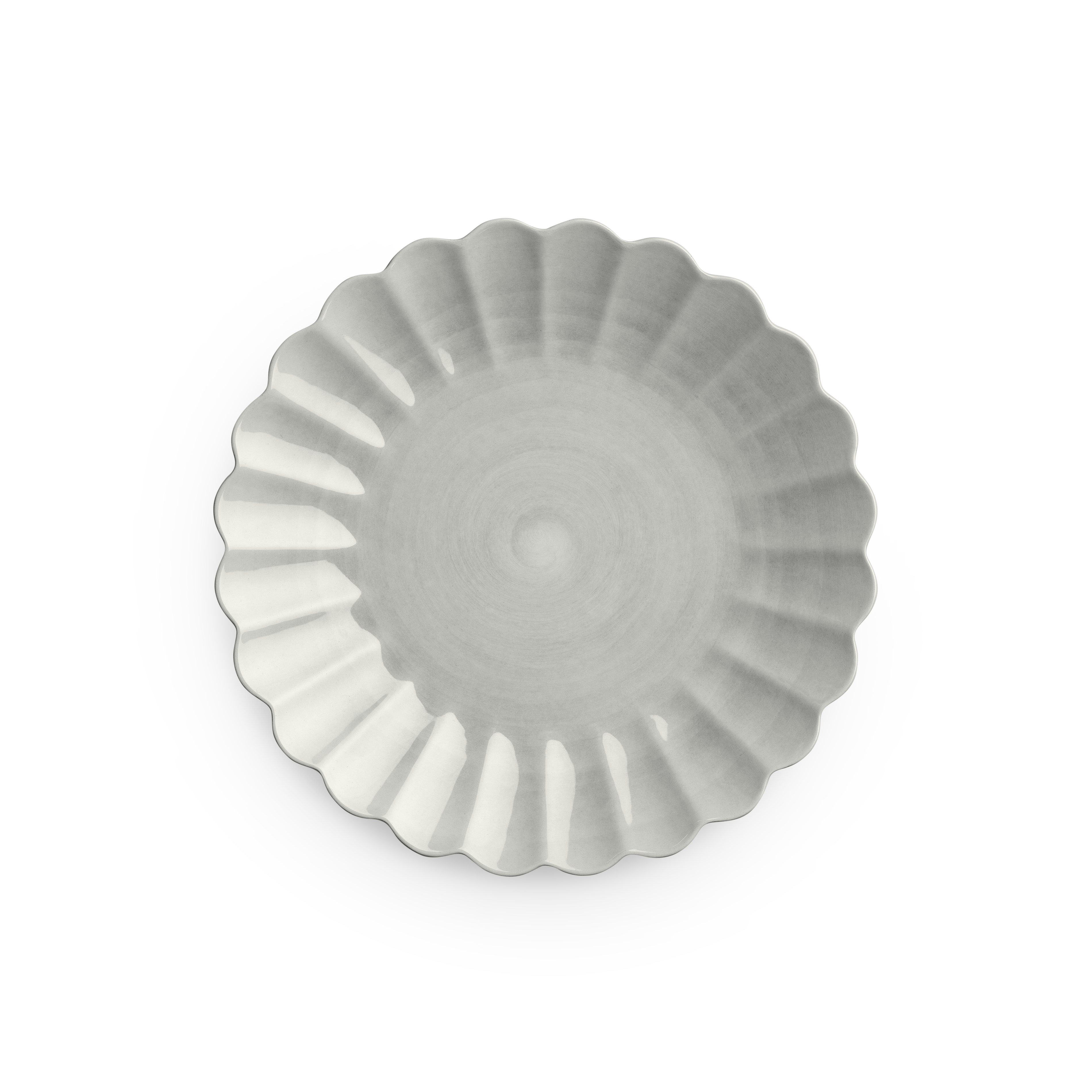 Fluted ceramic bowl on a white background