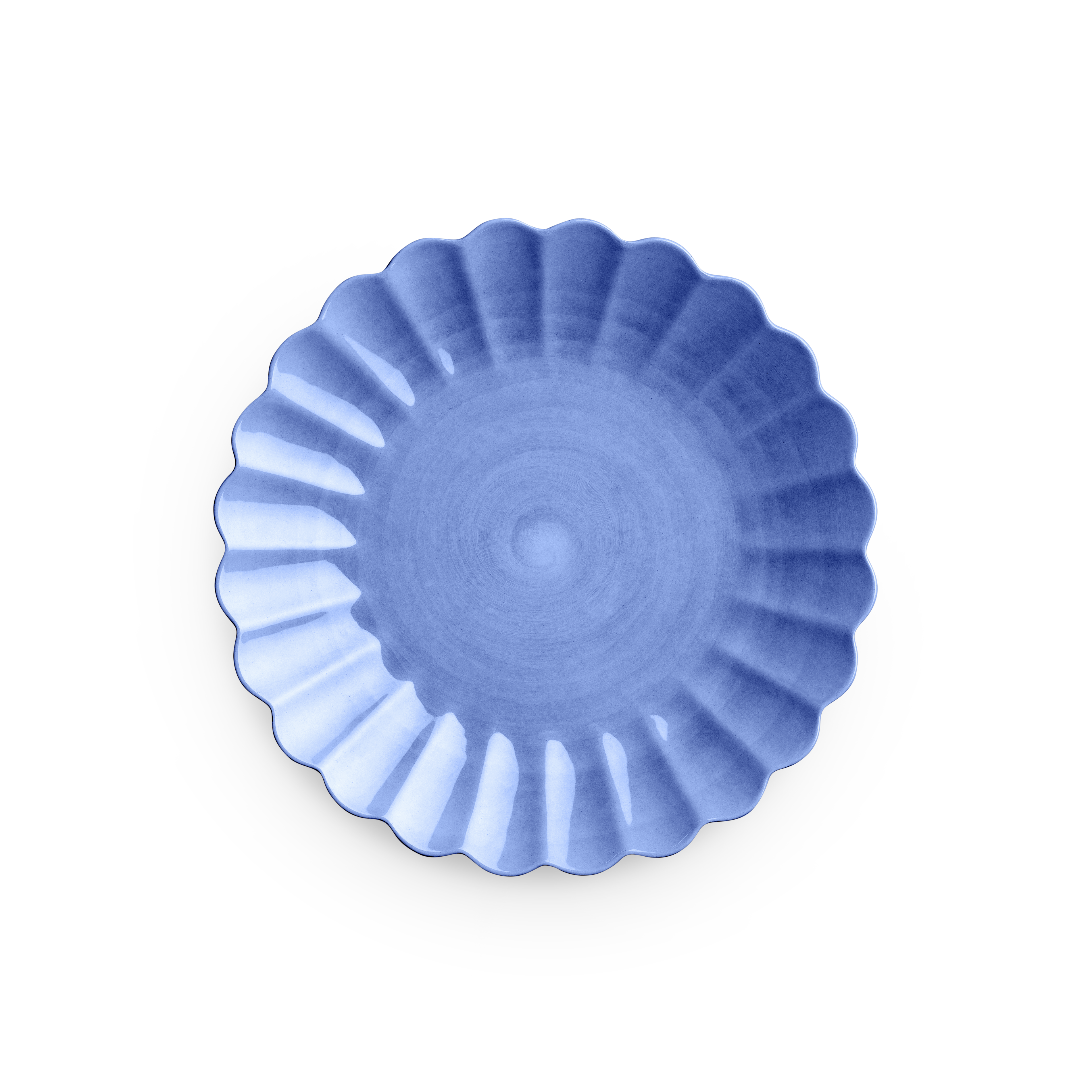 Blue scalloped-edge bowl on a white background