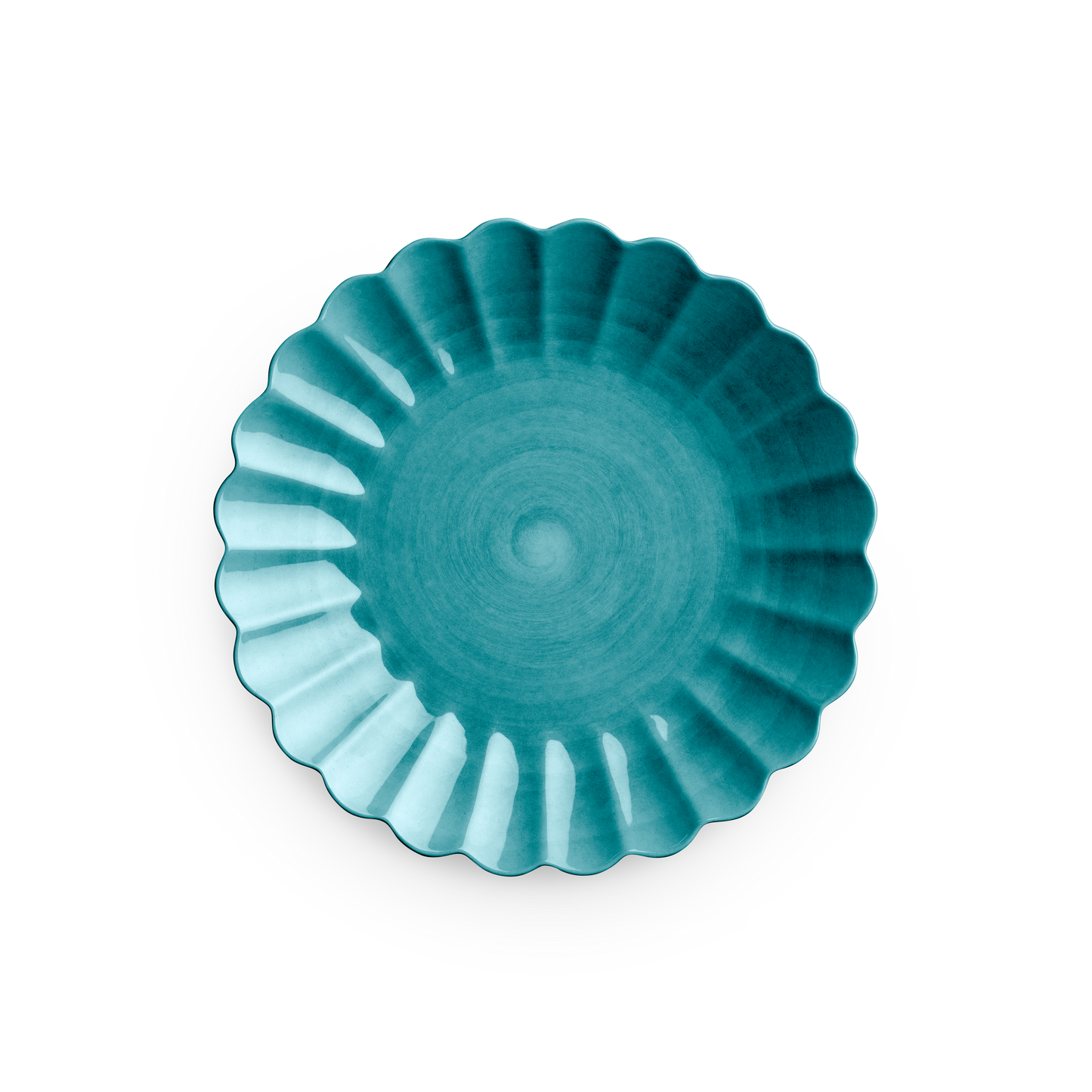 Teal ceramic plate with decorative edge on a white background