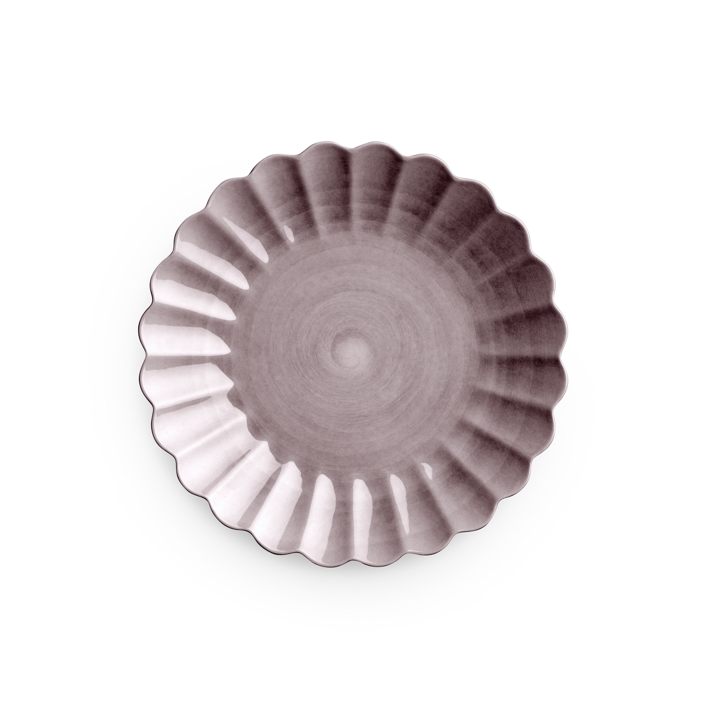 Decorative plate with scalloped edge on a white background