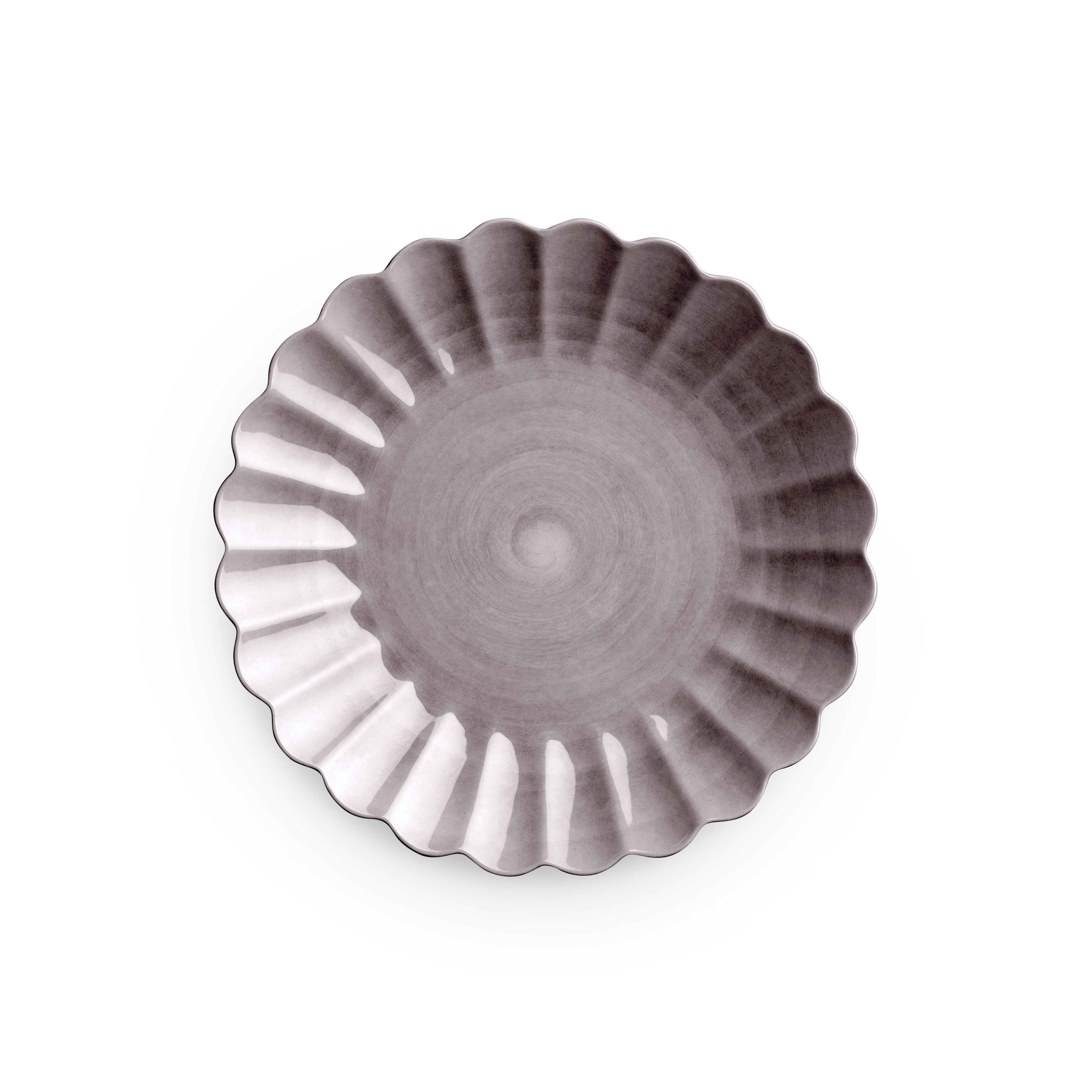 Decorative plate with scalloped edge on a white background