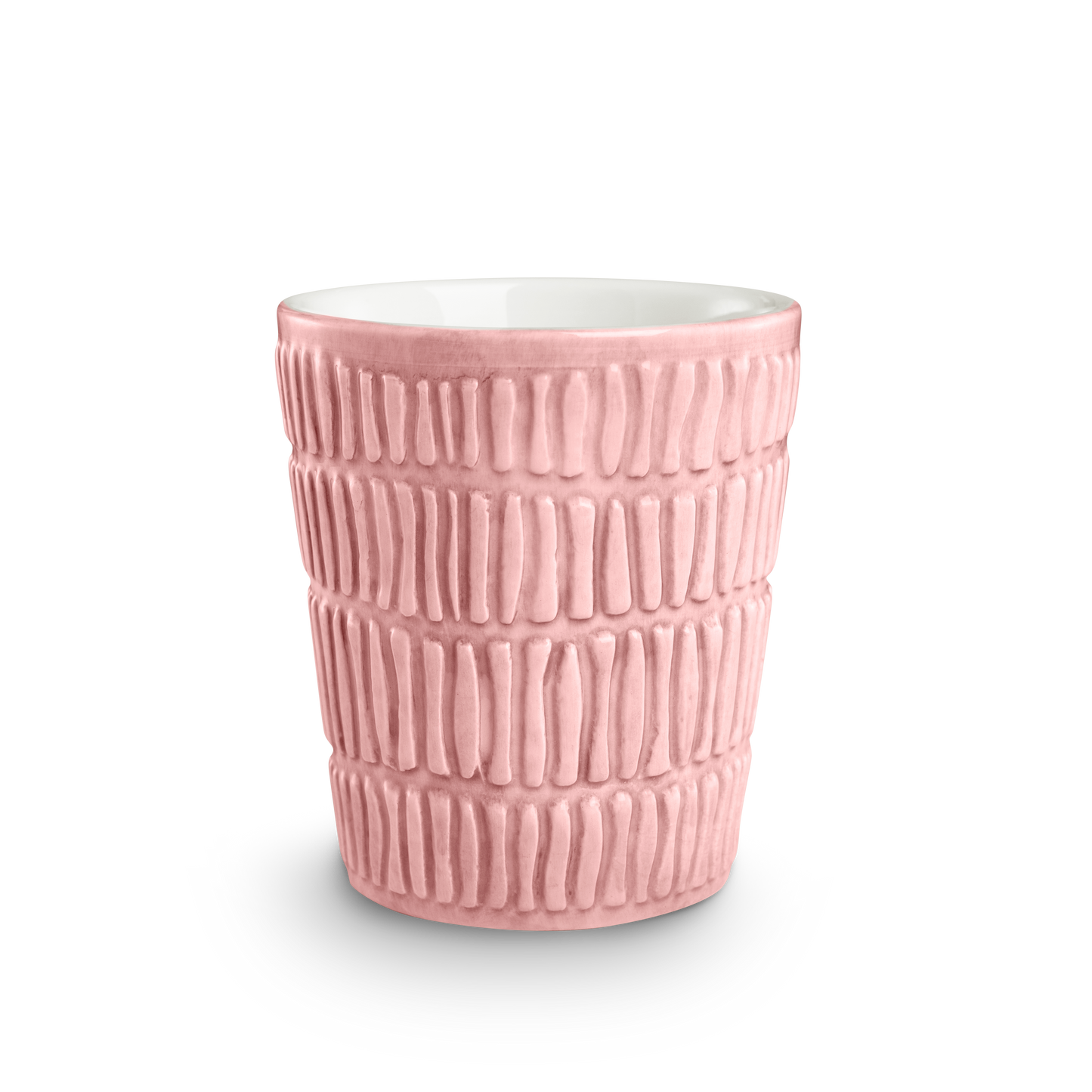Textured ceramic cup on a white background