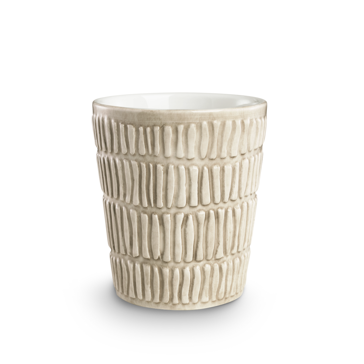 Textured ceramic cup on a white background