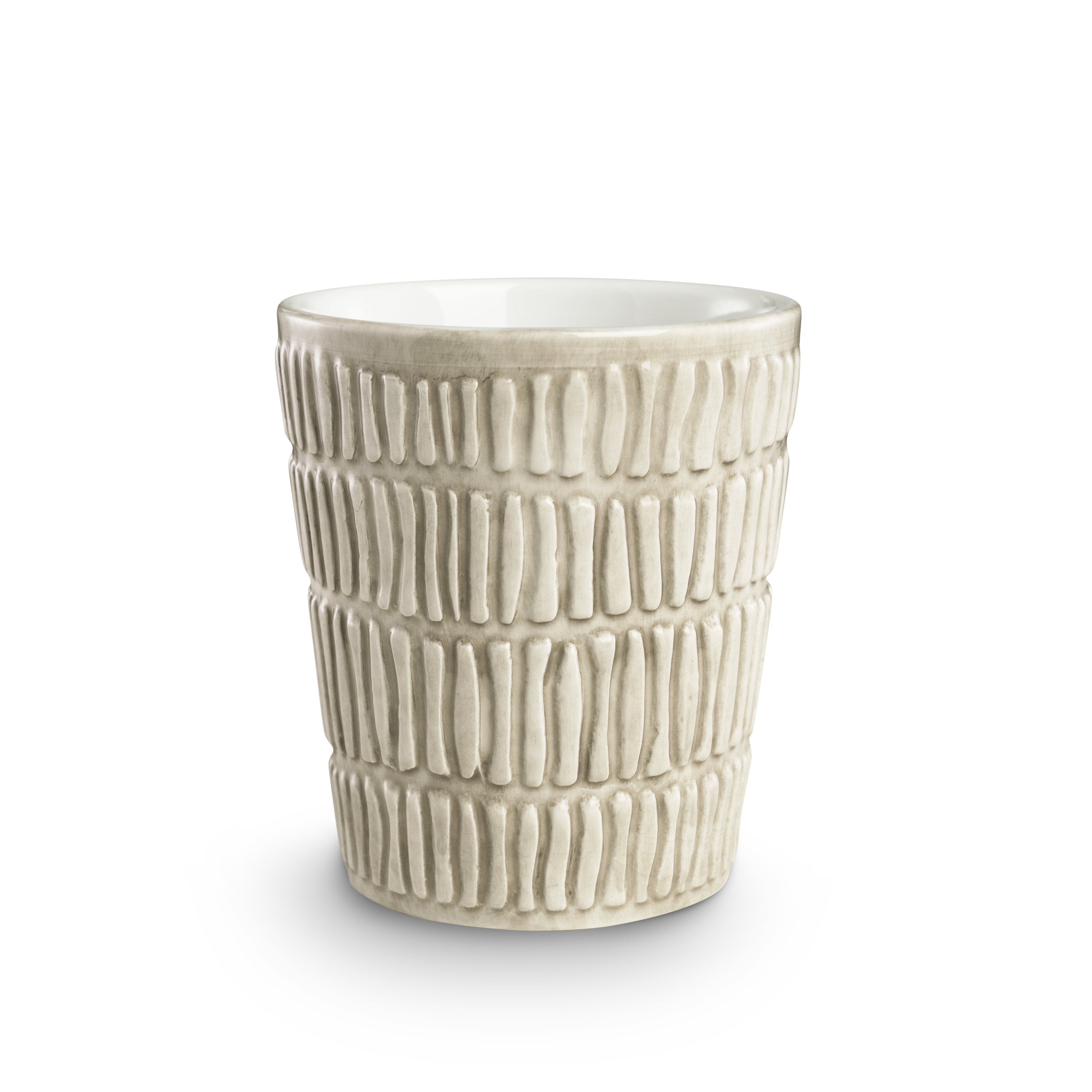 Textured ceramic cup on a white background