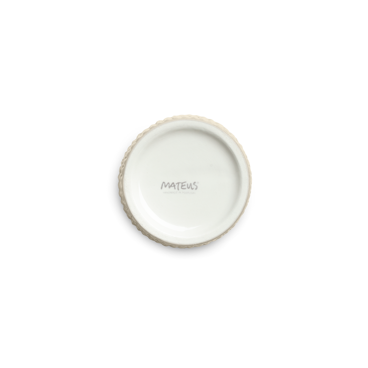 Small ceramic mug with 'Mateus' branding on a white background