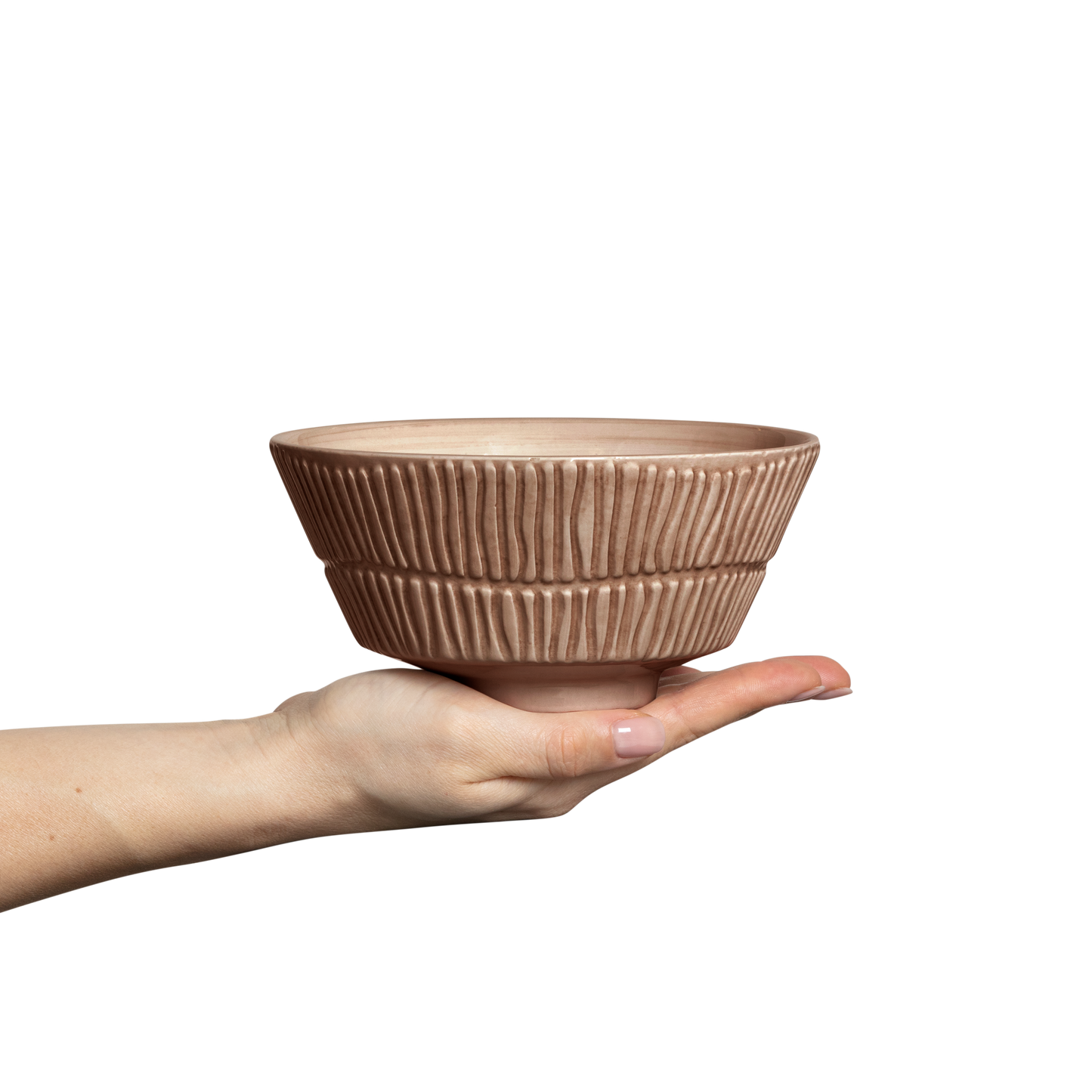 Hand holding a textured ceramic bowl against a white background