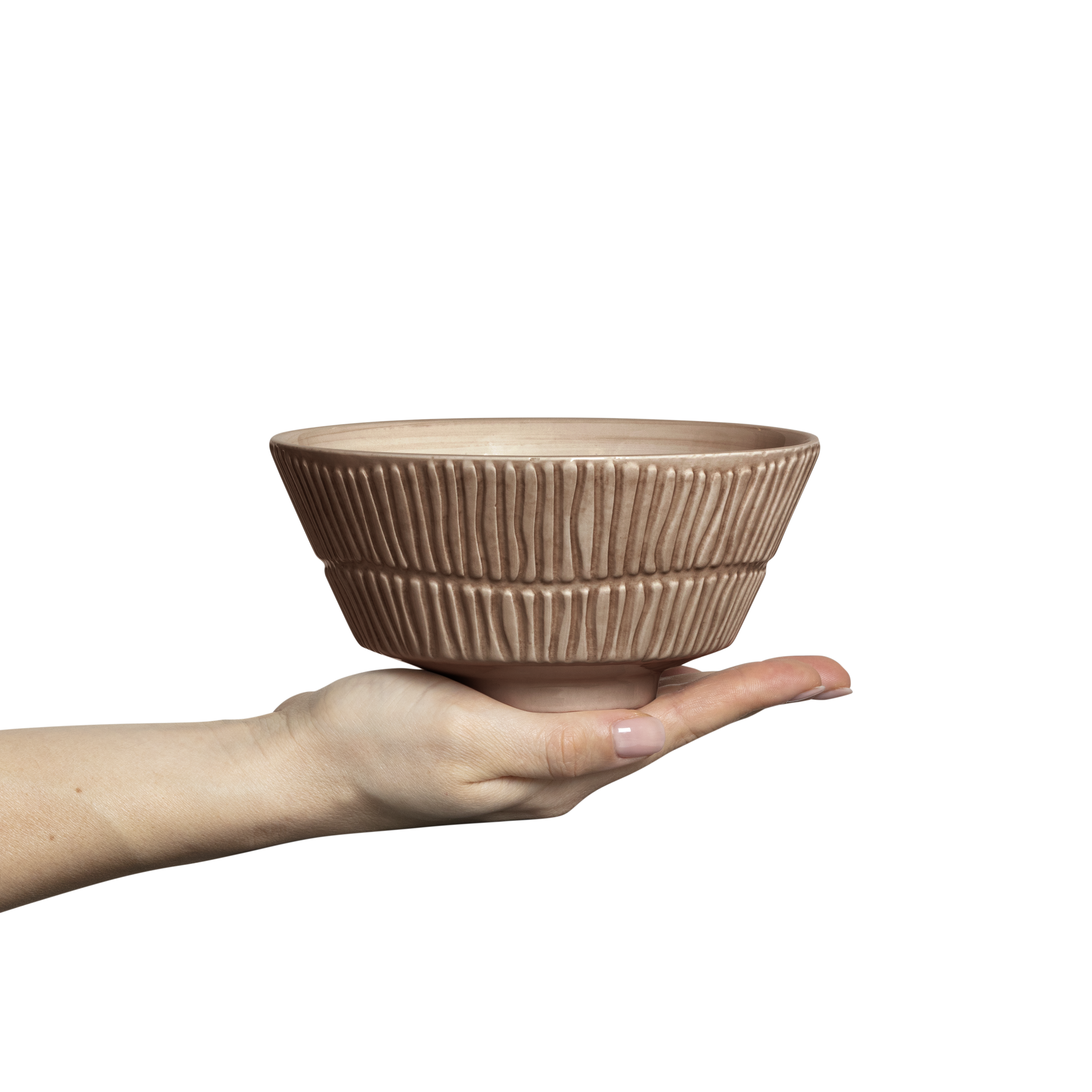 Hand holding a textured ceramic bowl against a white background