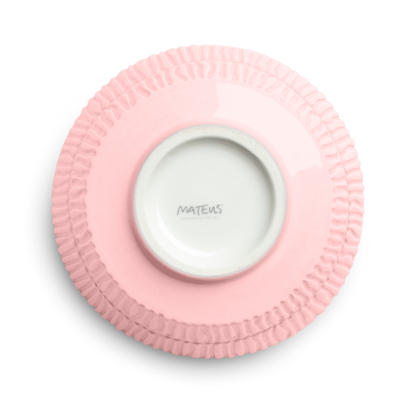 Pink ceramic plate with textured rim and white center displaying 'Mateus' brand name on a white background