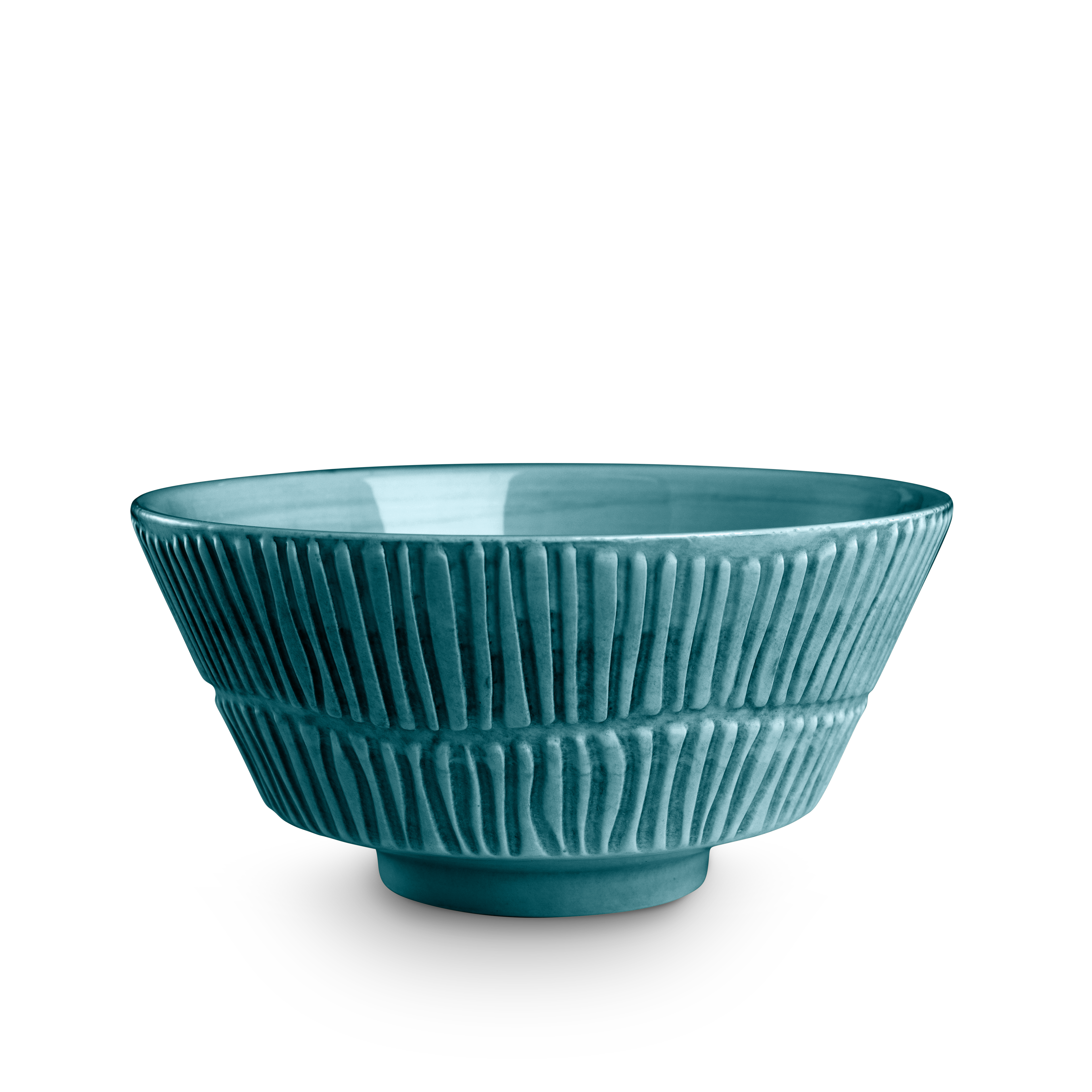 Teal ceramic bowl with textured design on a white background