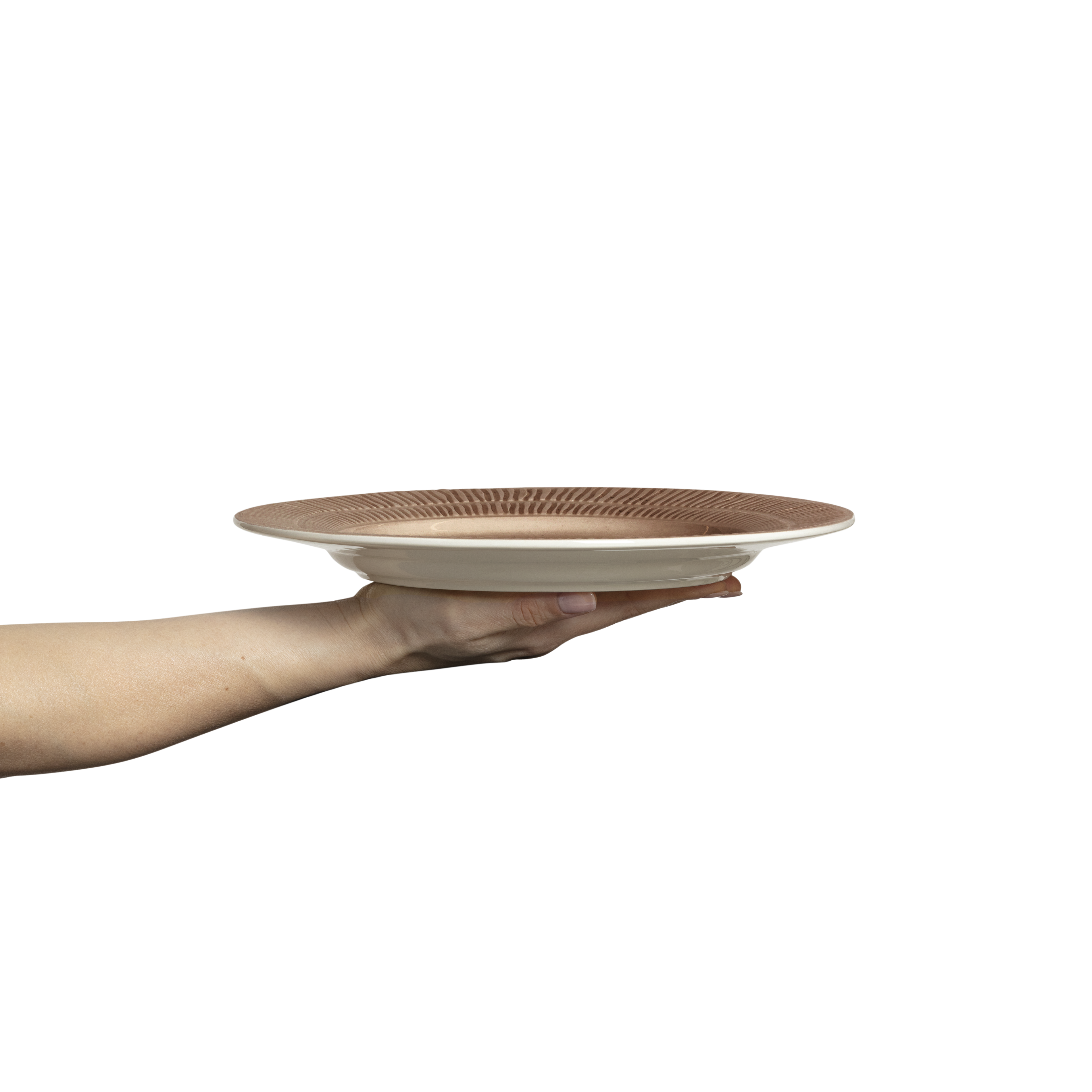 Hand holding a ceramic plate with a textured surface on a white background