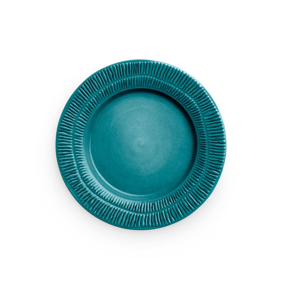 Teal ceramic plate with textured rim on a white background
