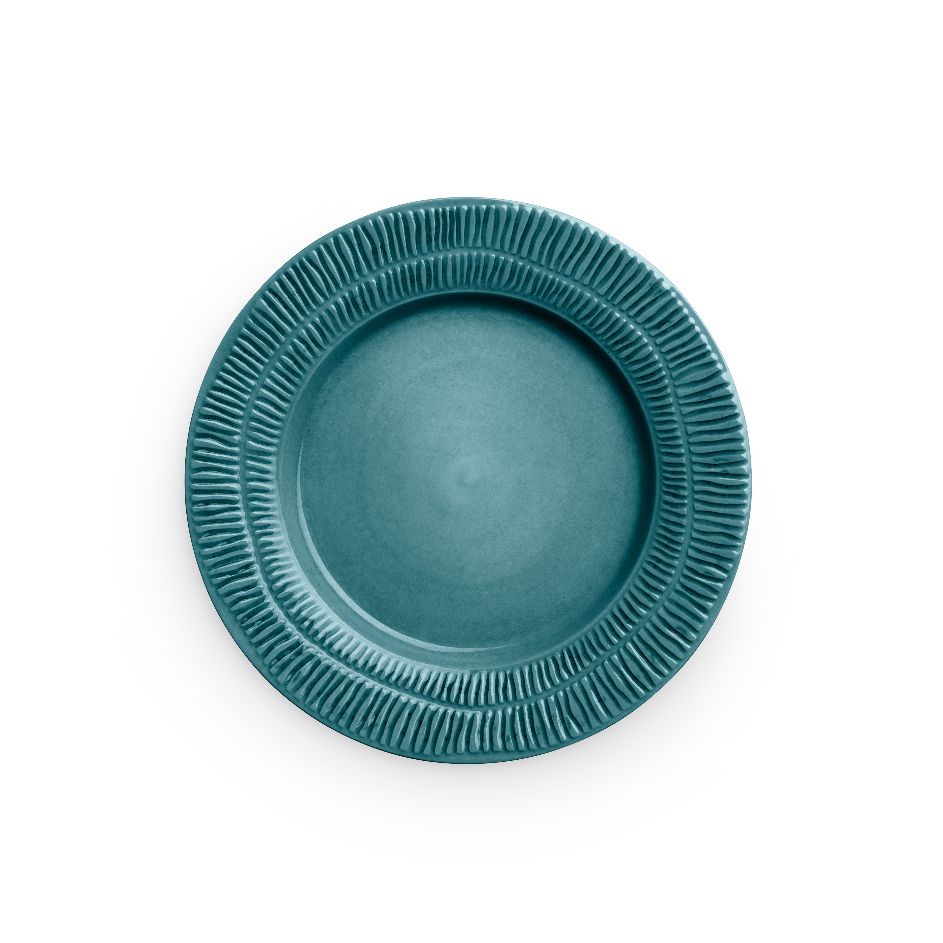 Teal ceramic plate with textured rim on a white background