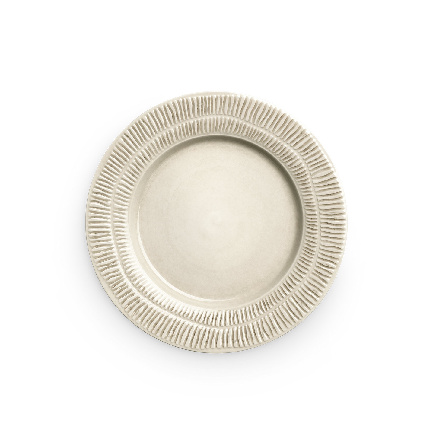Beige ceramic plate with textured rim on a white background
