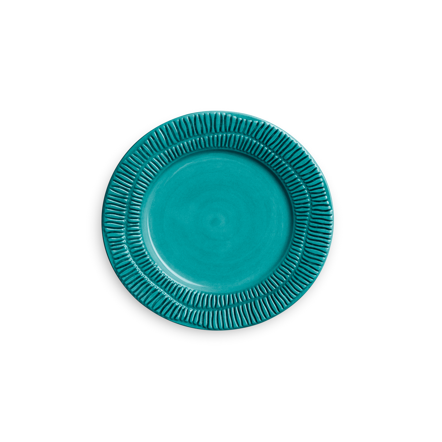 Teal ceramic plate with textured rim on a white background