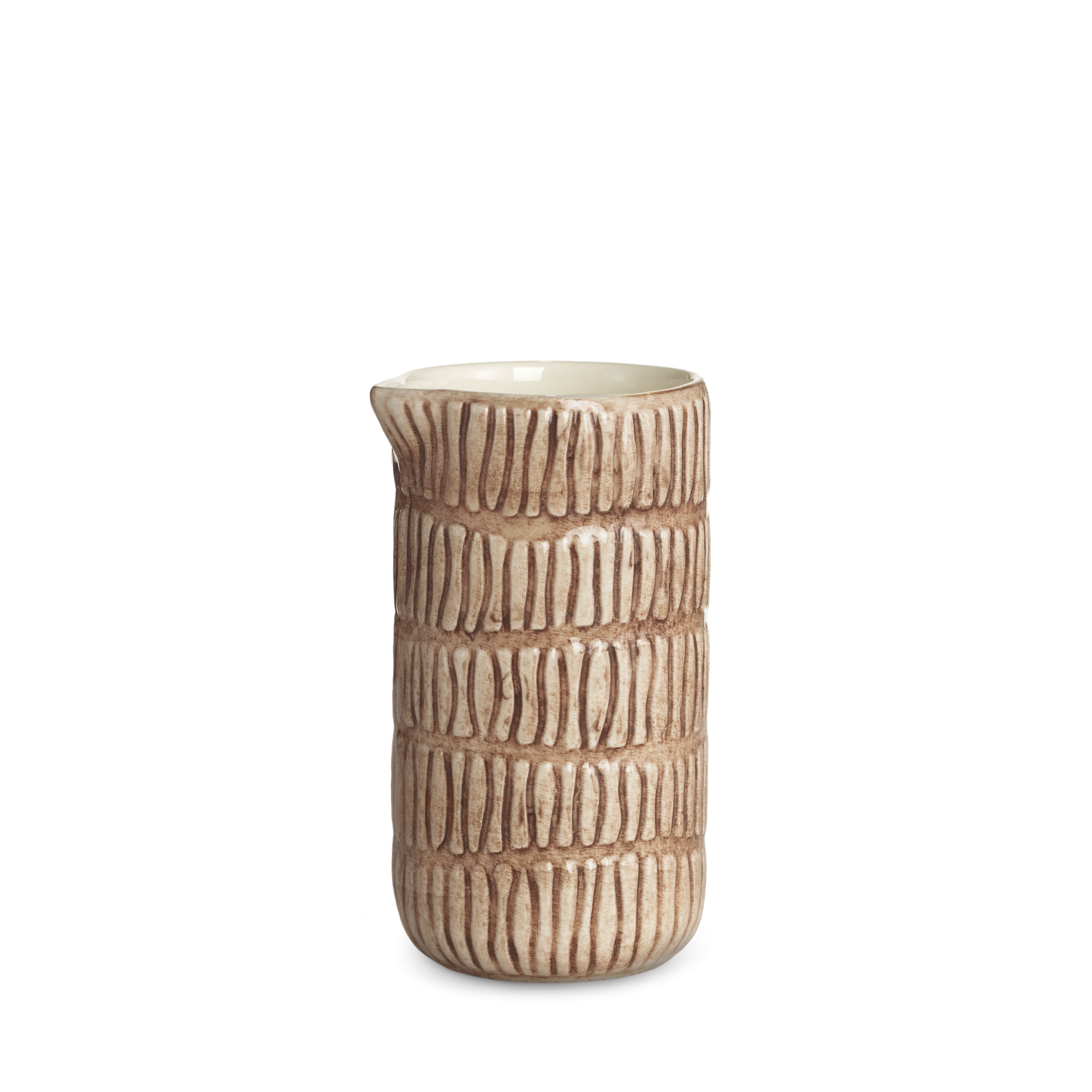 Ceramic pitcher with textured design on a white background