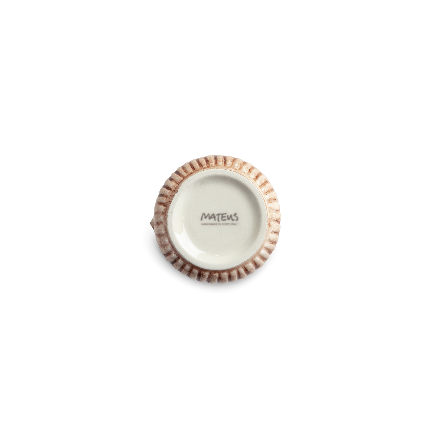 Bottom of a small jug with textured rim on a white background