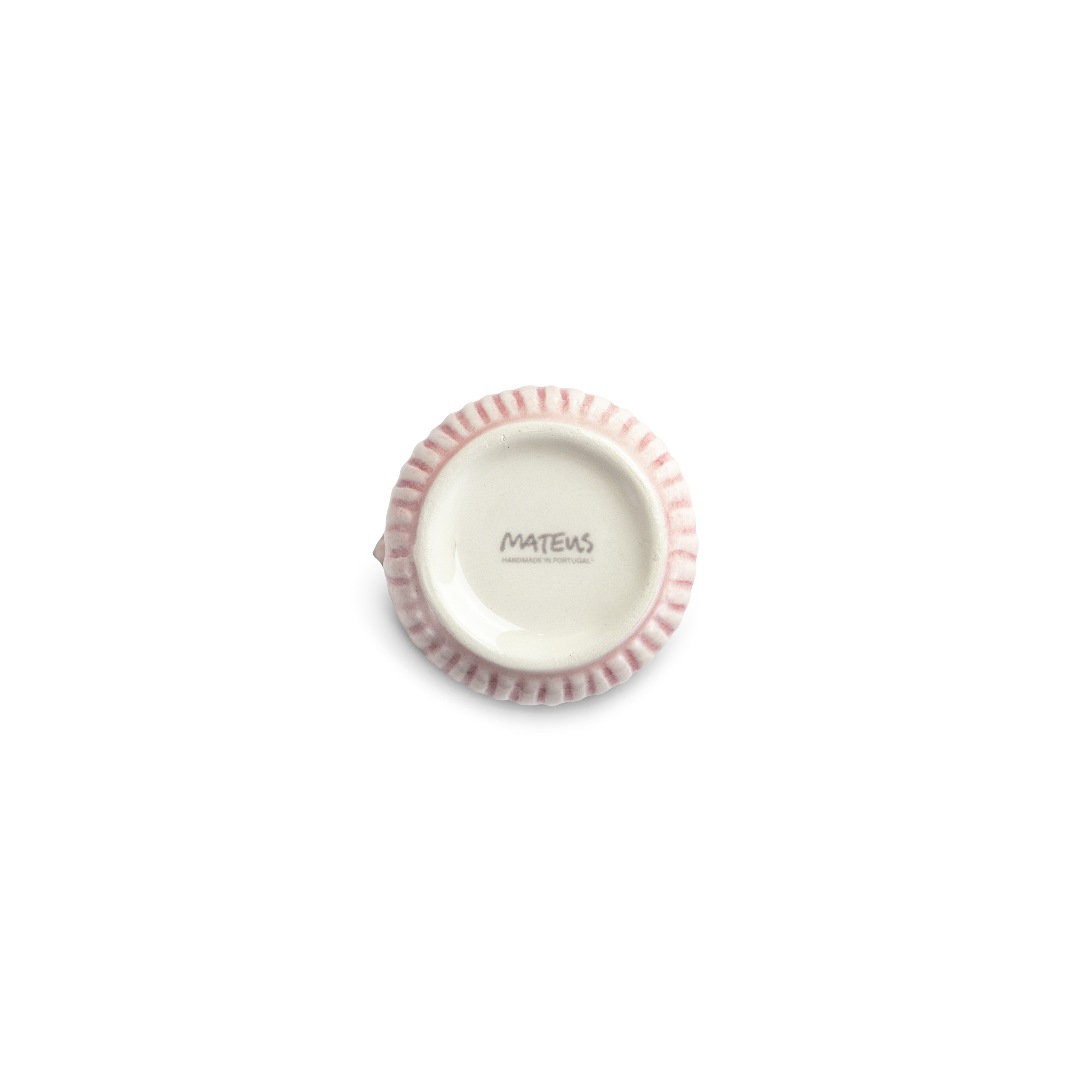 Small pink jug and 'Mateus' branding on a white background
