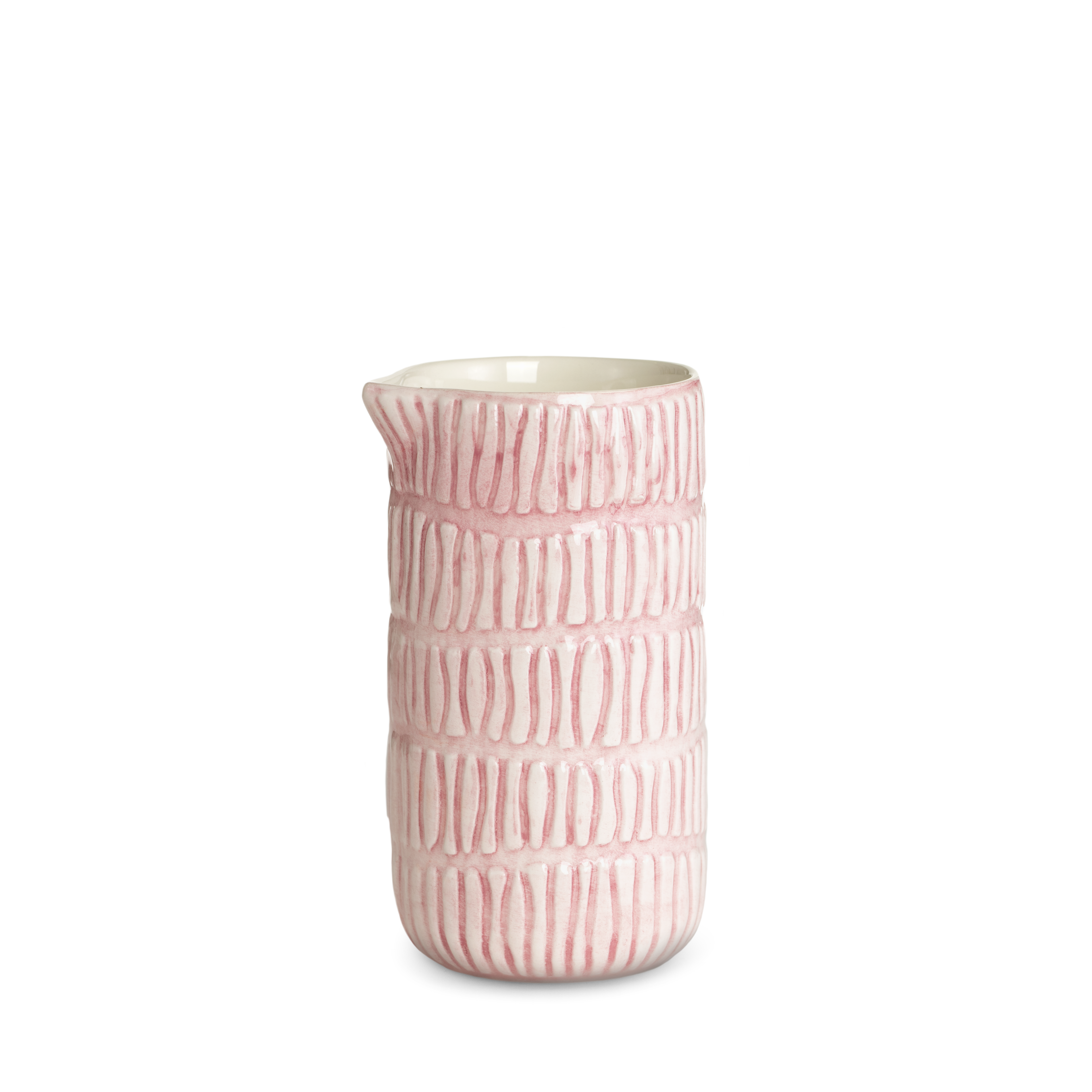 Pink ceramic jug with a textured pattern on a white background