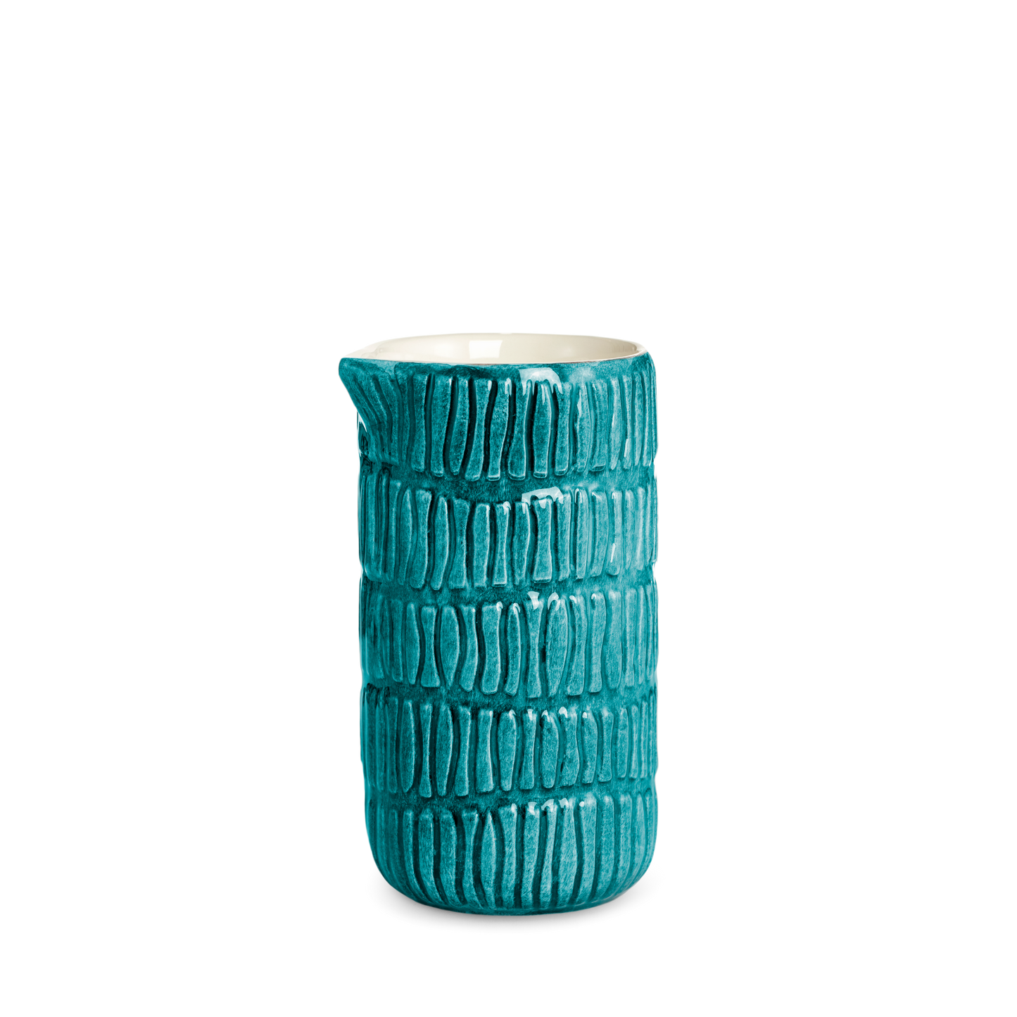 Ceramic jug with textured design on a white background
