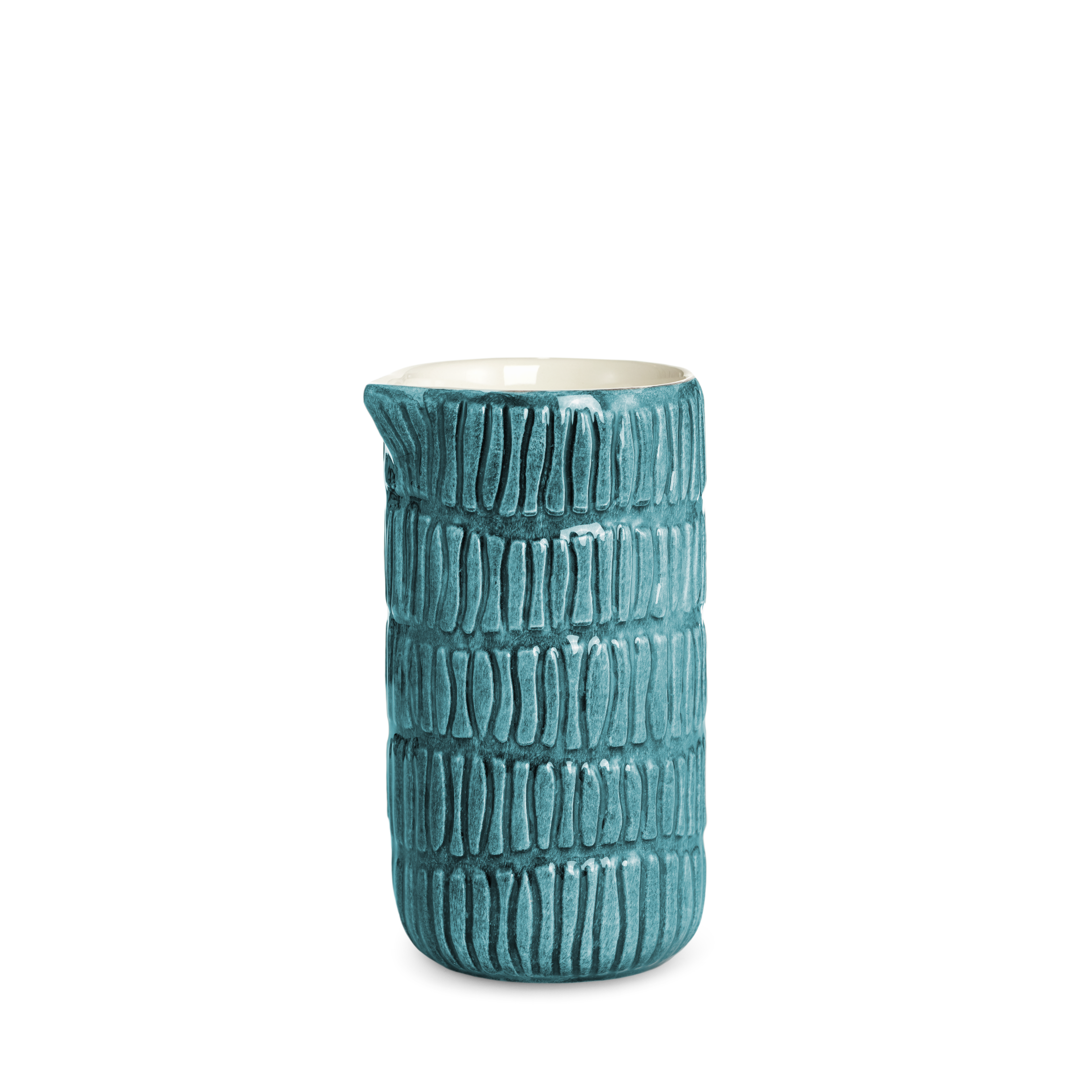Ceramic jug with textured design on a white background