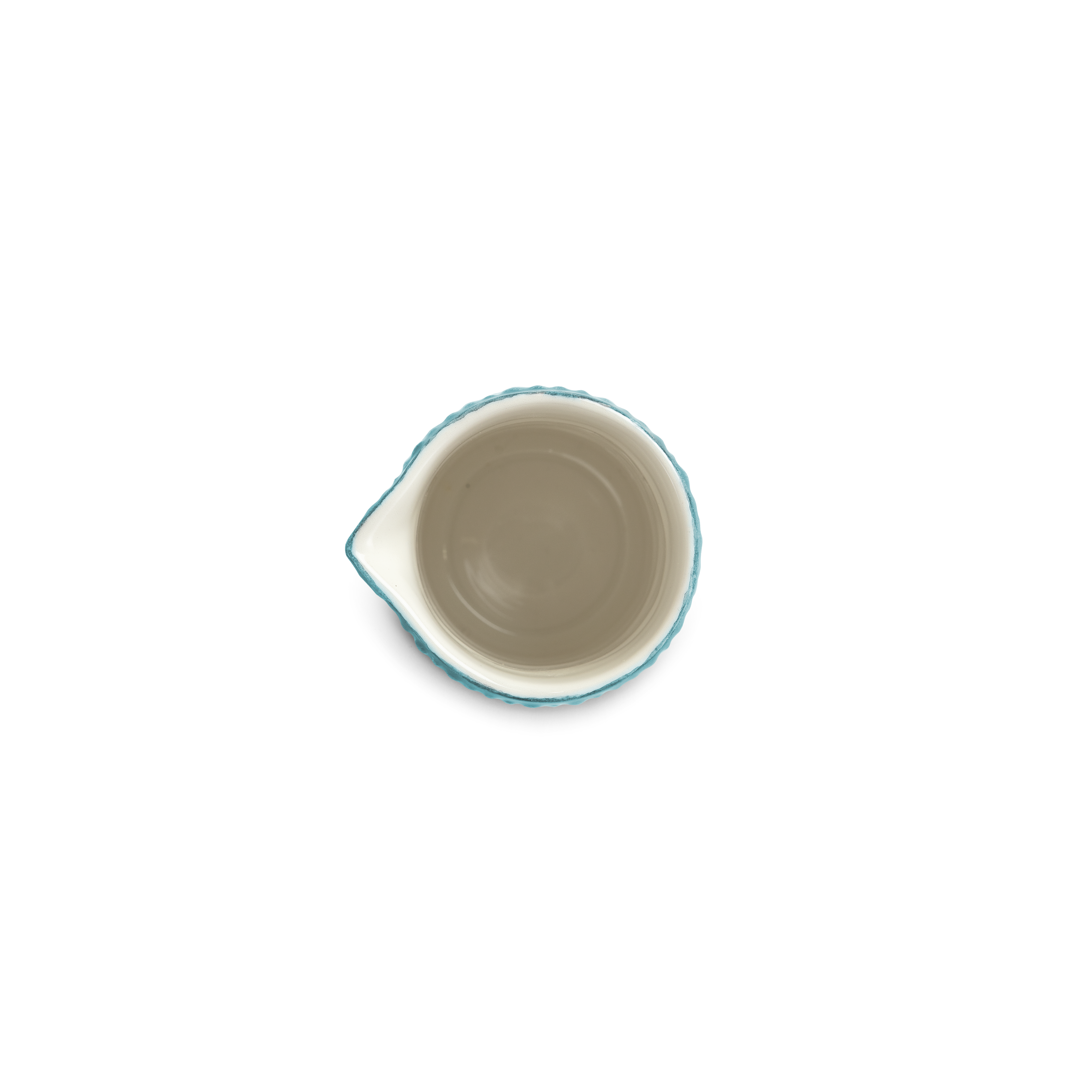 Ceramic jug with blue rim on a white background from above