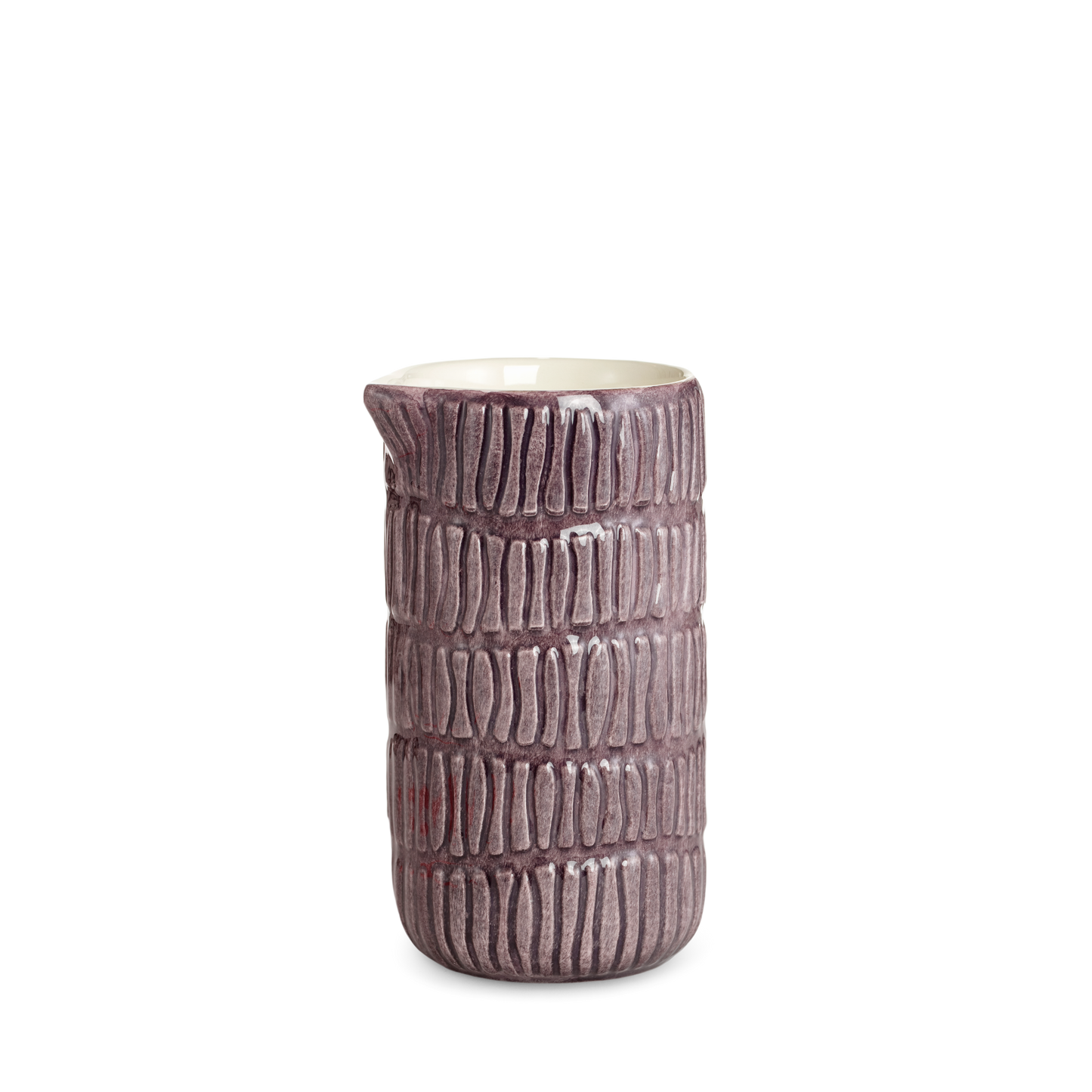 Textured ceramic jug on a white background