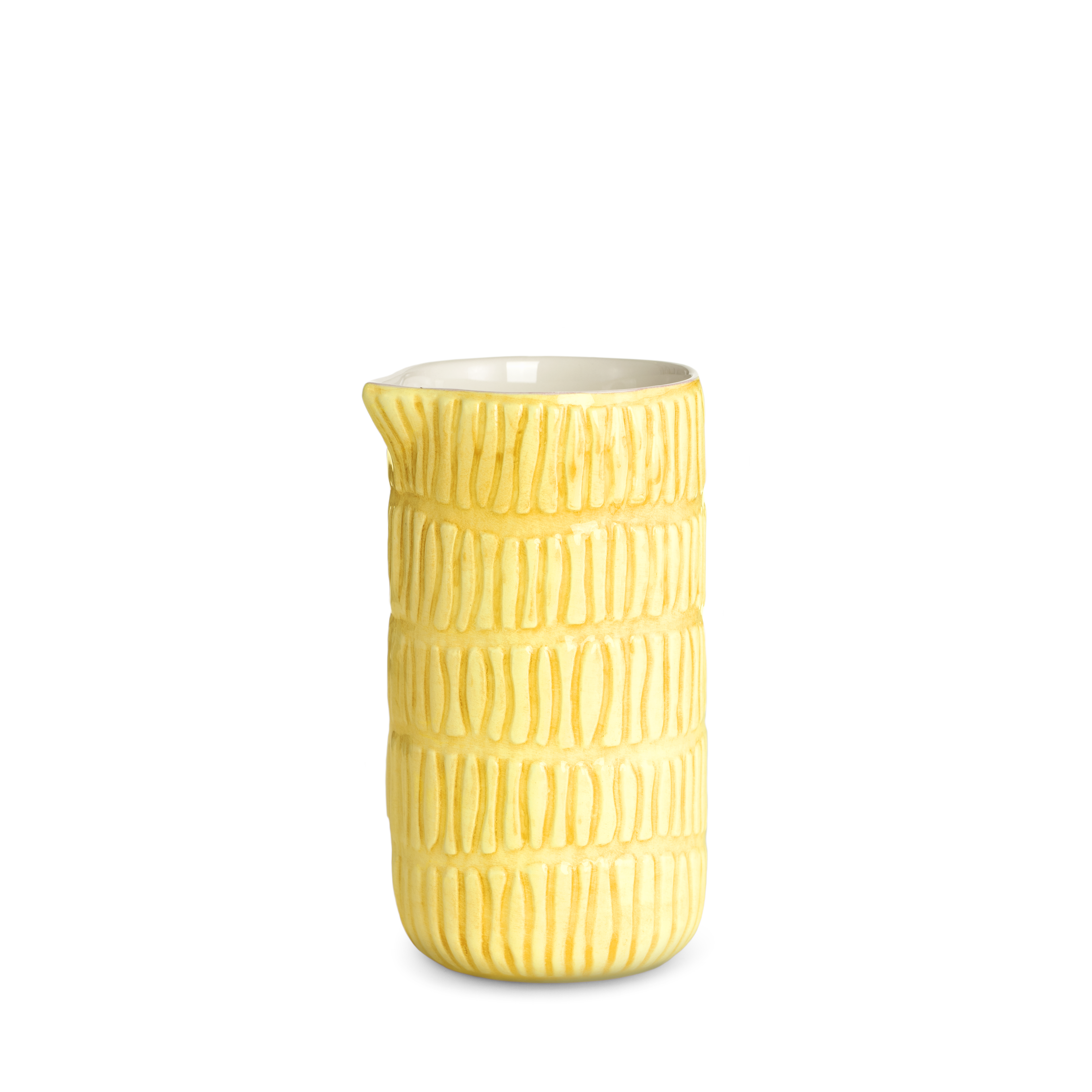 Yellow textured ceramic jug on a white background