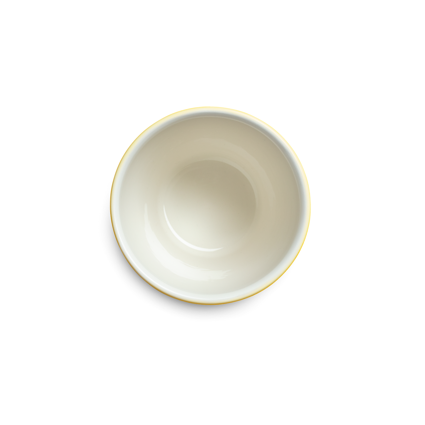Yellow mug from above on a white background