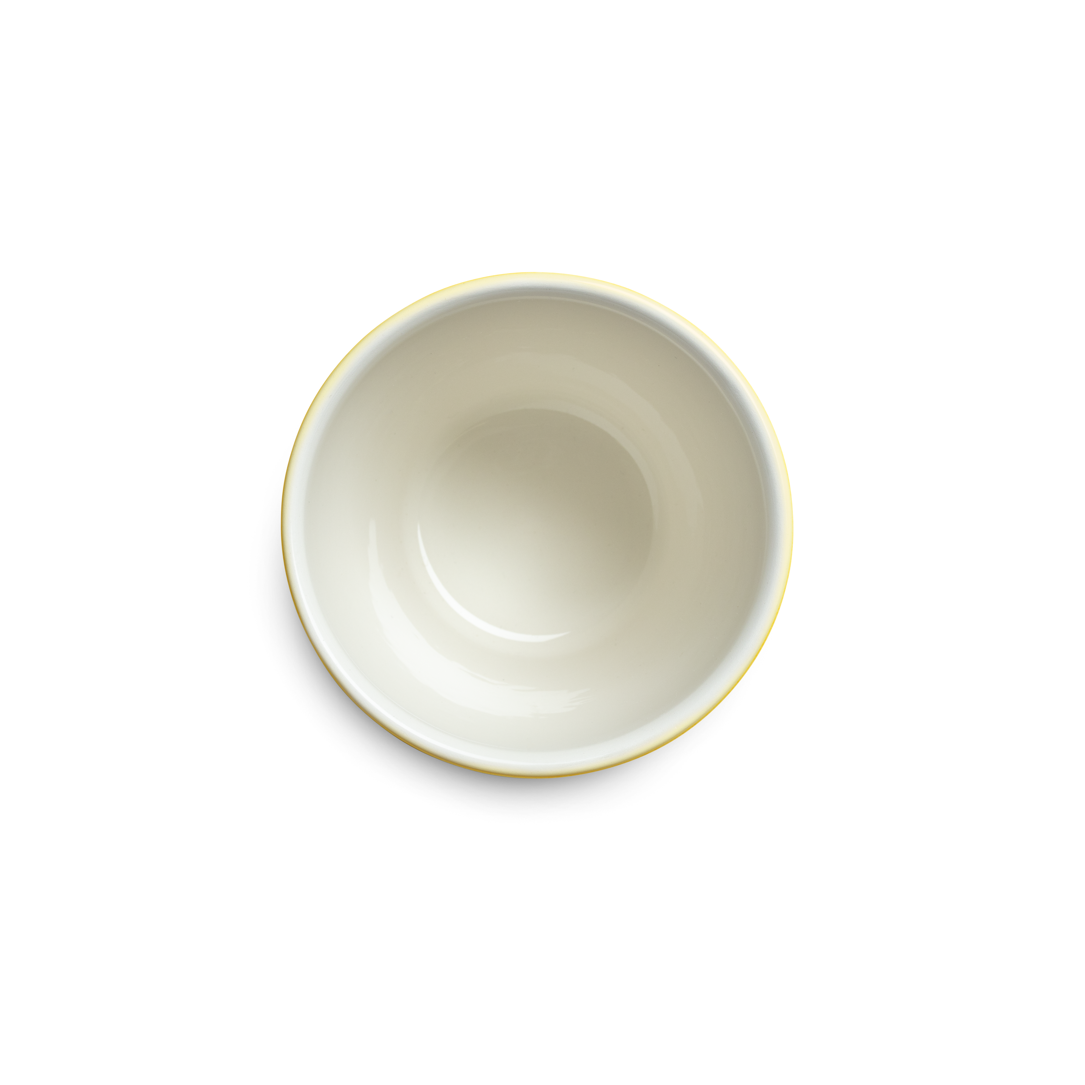 Yellow mug from above on a white background