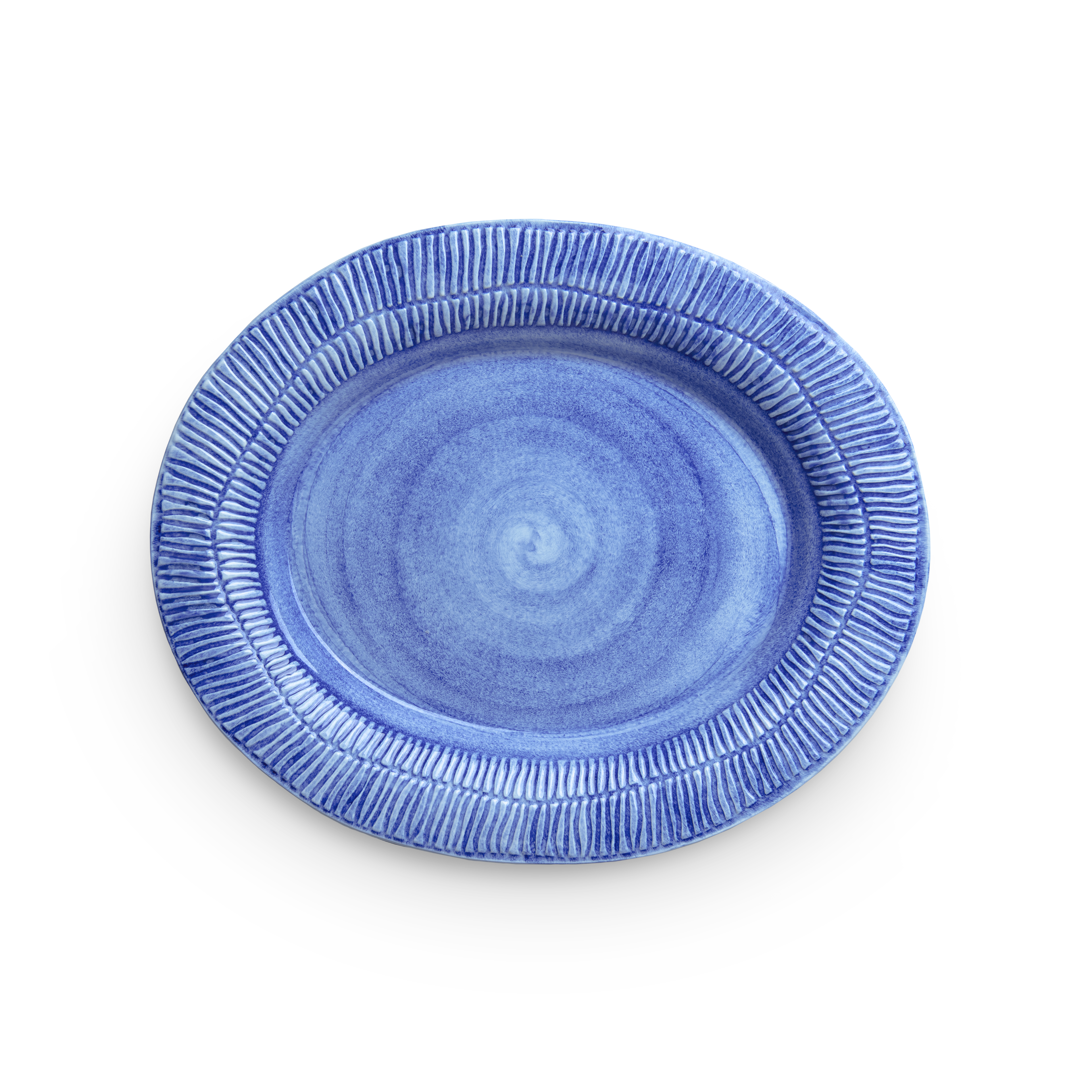 Blue ceramic plate with textured rim on a white background