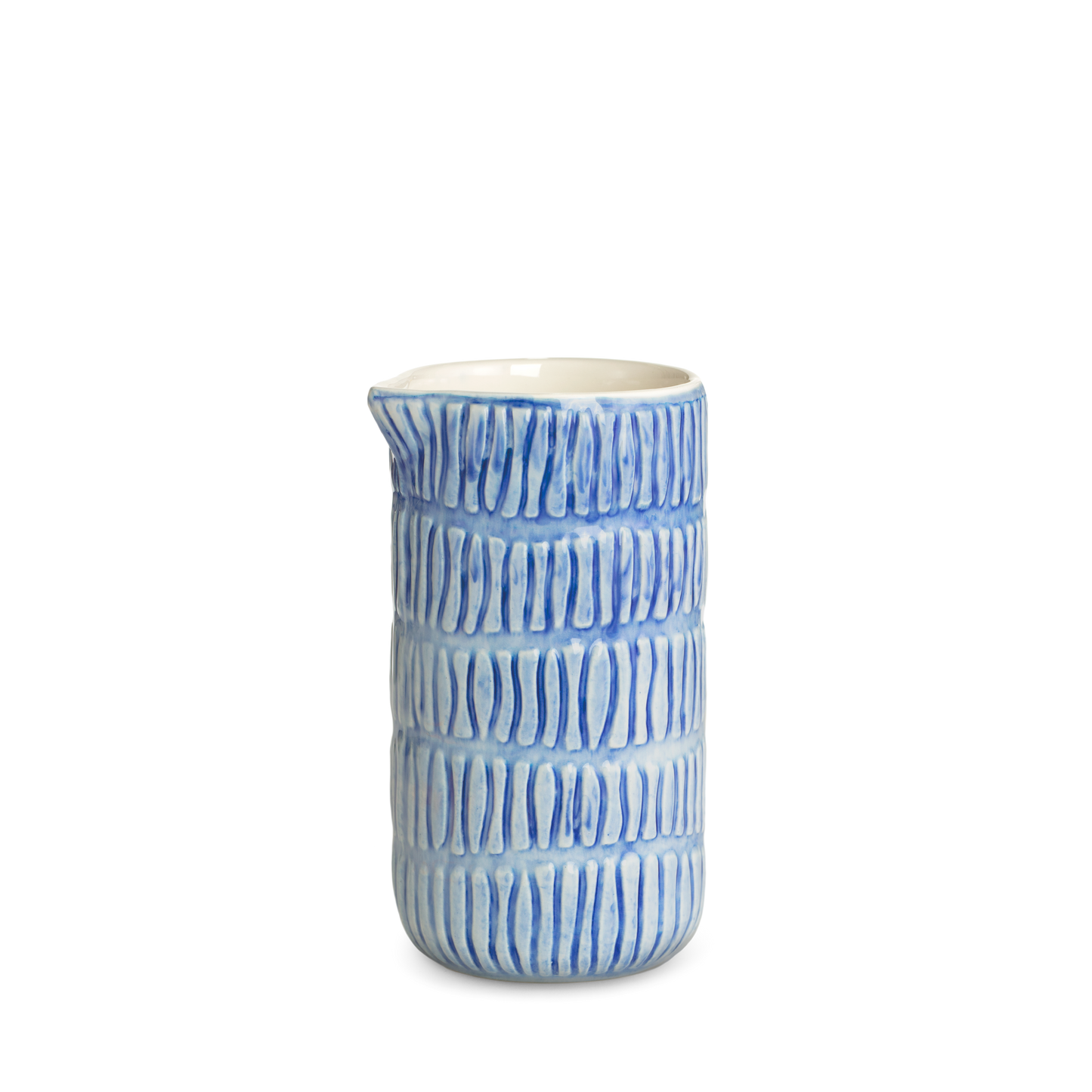 Ceramic jug with blue pattern on a white background
